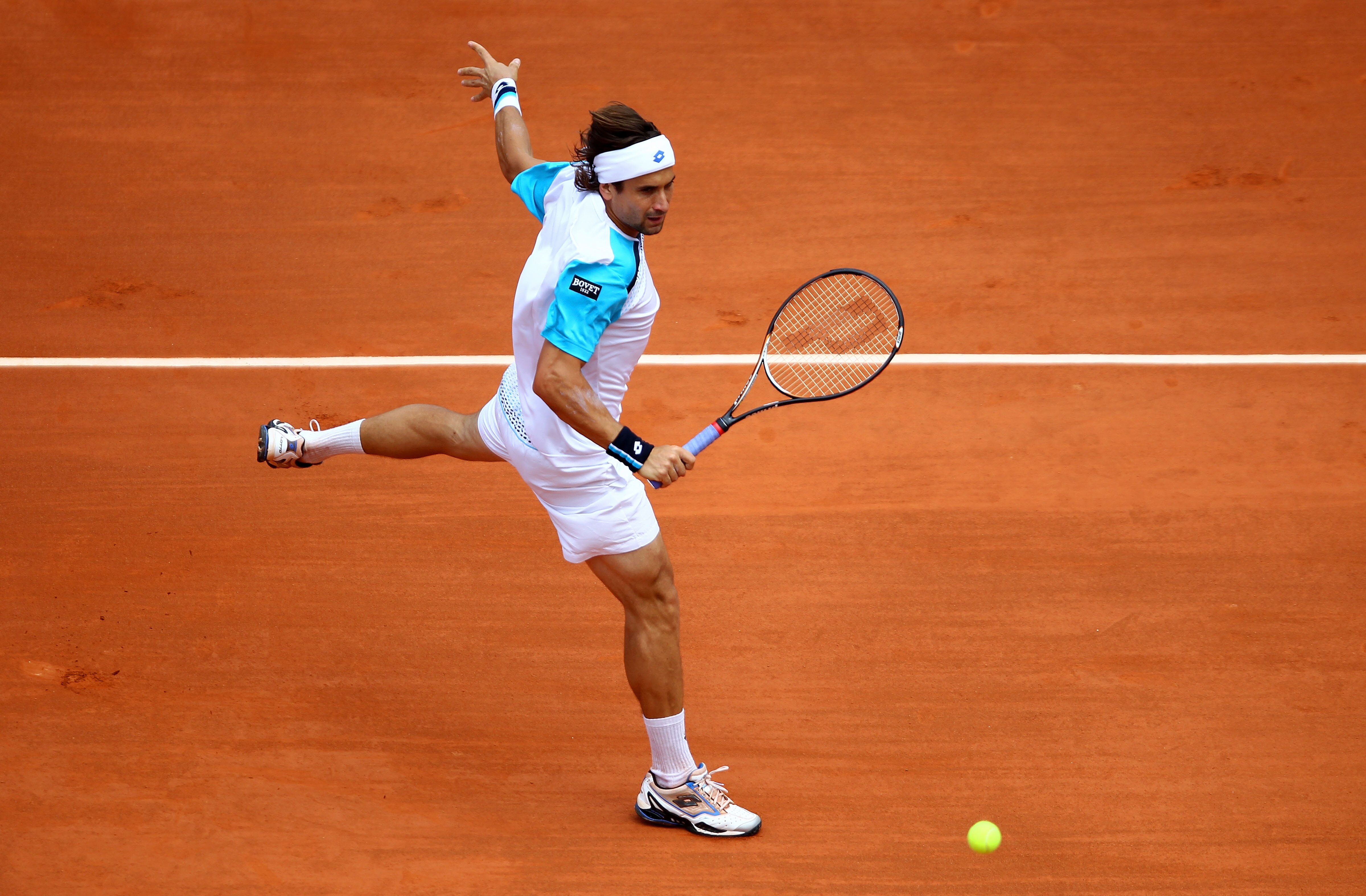 PARIS, FRANCE - MAY 22: David Ferrer of Spain plays a backhand during the men's singles round one match between David Ferrer of Spain and Jarkko Nieminen of Finland on day one of the French Open at Roland Garros on May 22, 2011 in Paris, France. (Photo PARIS, FRANCE - MAY 22: David Ferrer of Spain plays a backhand during the men's singles round one match between David Ferrer of Spain and Jarkko Nieminen of Finland on day one of the French Open at Roland Garros on May 22, 2011 in Paris, France. (Photo