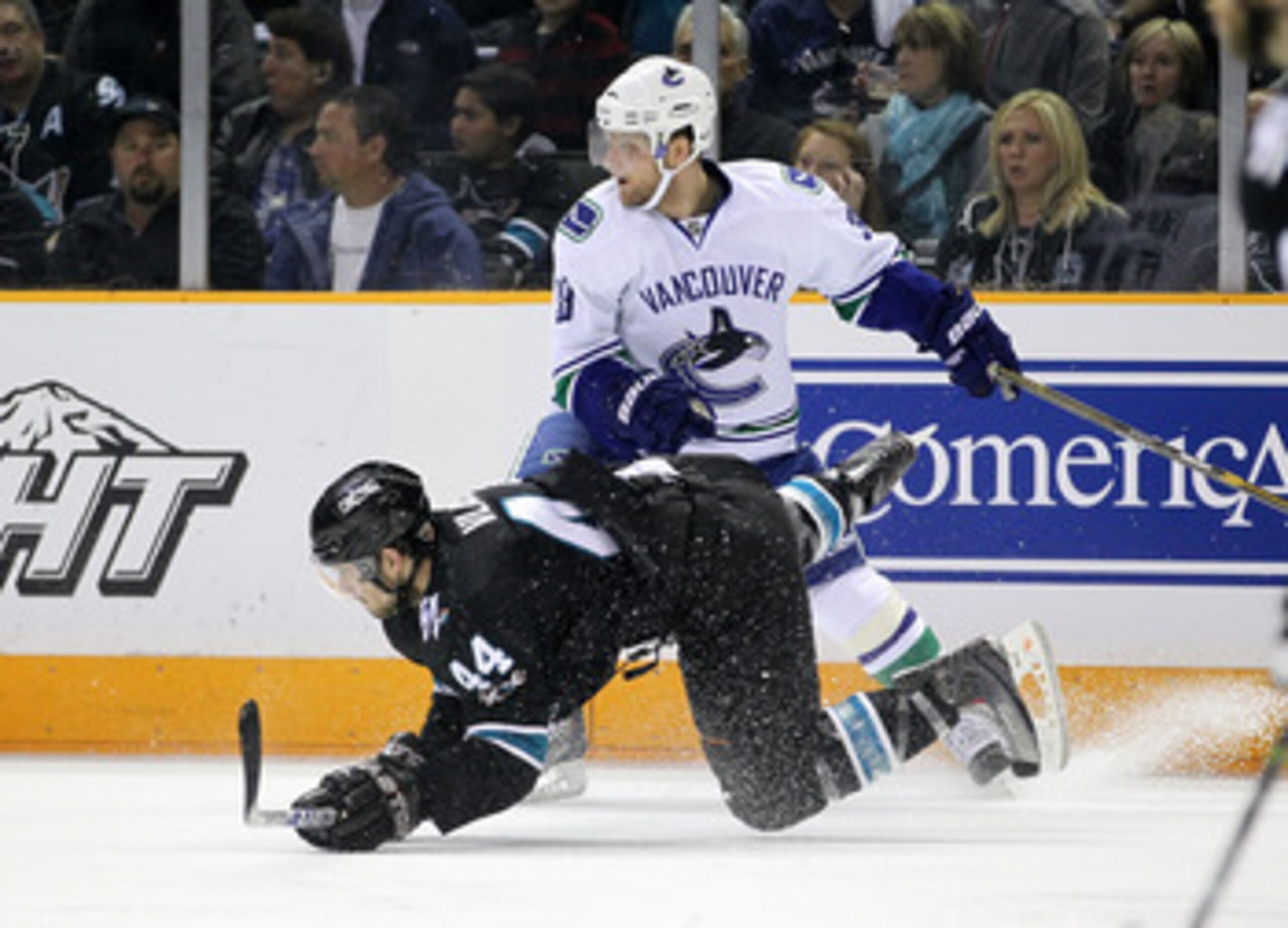 SAN JOSE, CA - MAY 22:  Cody Hodgson #39 of the Vancouver Canucks checks Marc-Edouard Vlasic #44 of the San Jose Sharks in the first period in Game Four of the Western Conference Finals during the 2011 Stanley Cup Playoffs at HP Pavilion on May 22, 2011 i