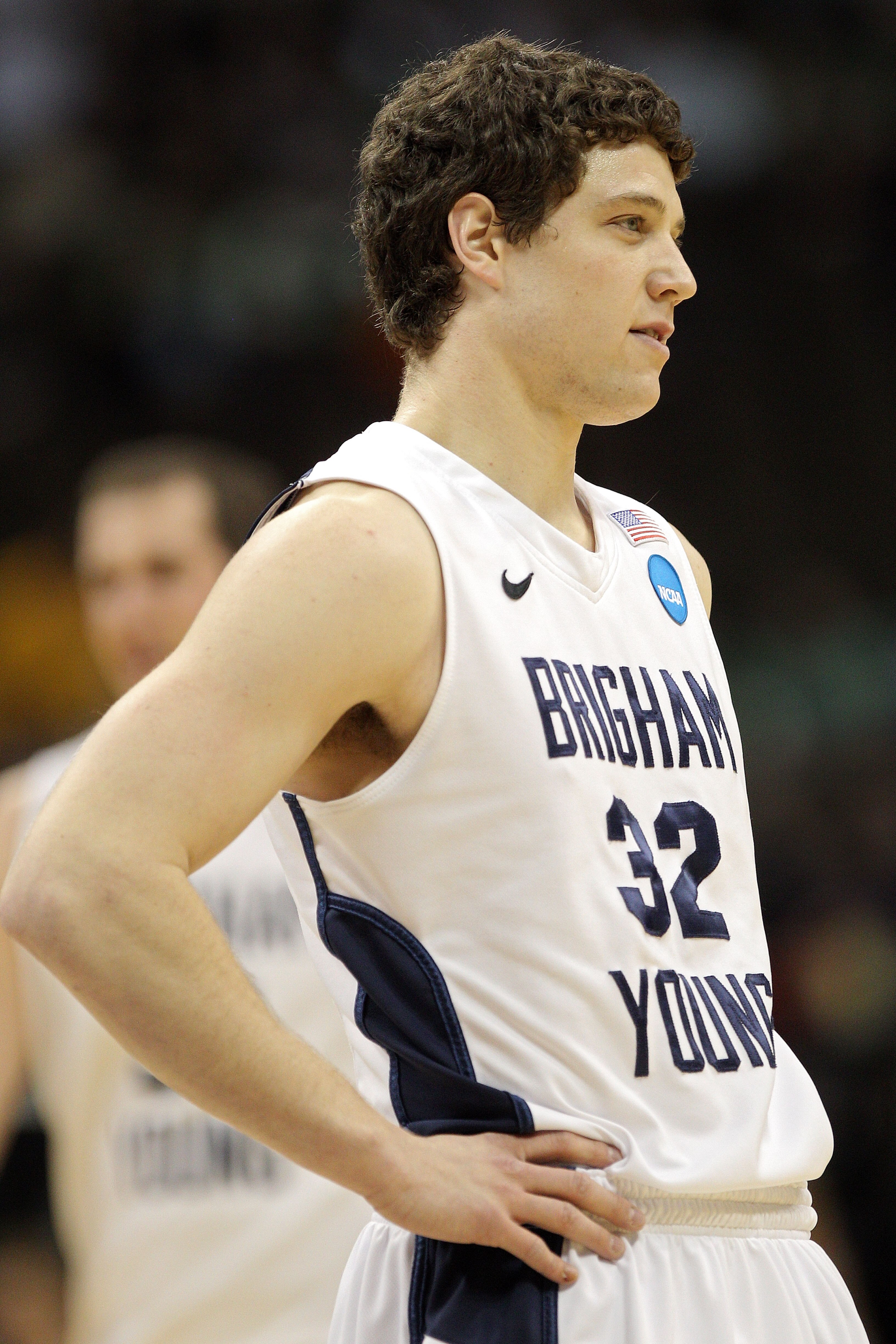 DENVER, CO - MARCH 17:  Jimmer Fredette #32 of the Brigham Young Cougars looks on against the Wofford Terriers during the second round of the 2011 NCAA men's basketball tournament at Pepsi Center on March 17, 2011 in Denver, Colorado.  (Photo by Justin Ed