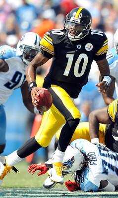 NASHVILLE, TN - SEPTEMBER 19:  Quarterback Dennis Dixon #10 of the Pittsburgh Steelers rolls out under pressure from the Tennessee Titans defense during the first half at LP Field on September 19, 2010 in Nashville, Tennessee.  (Photo by Grant Halverson/G