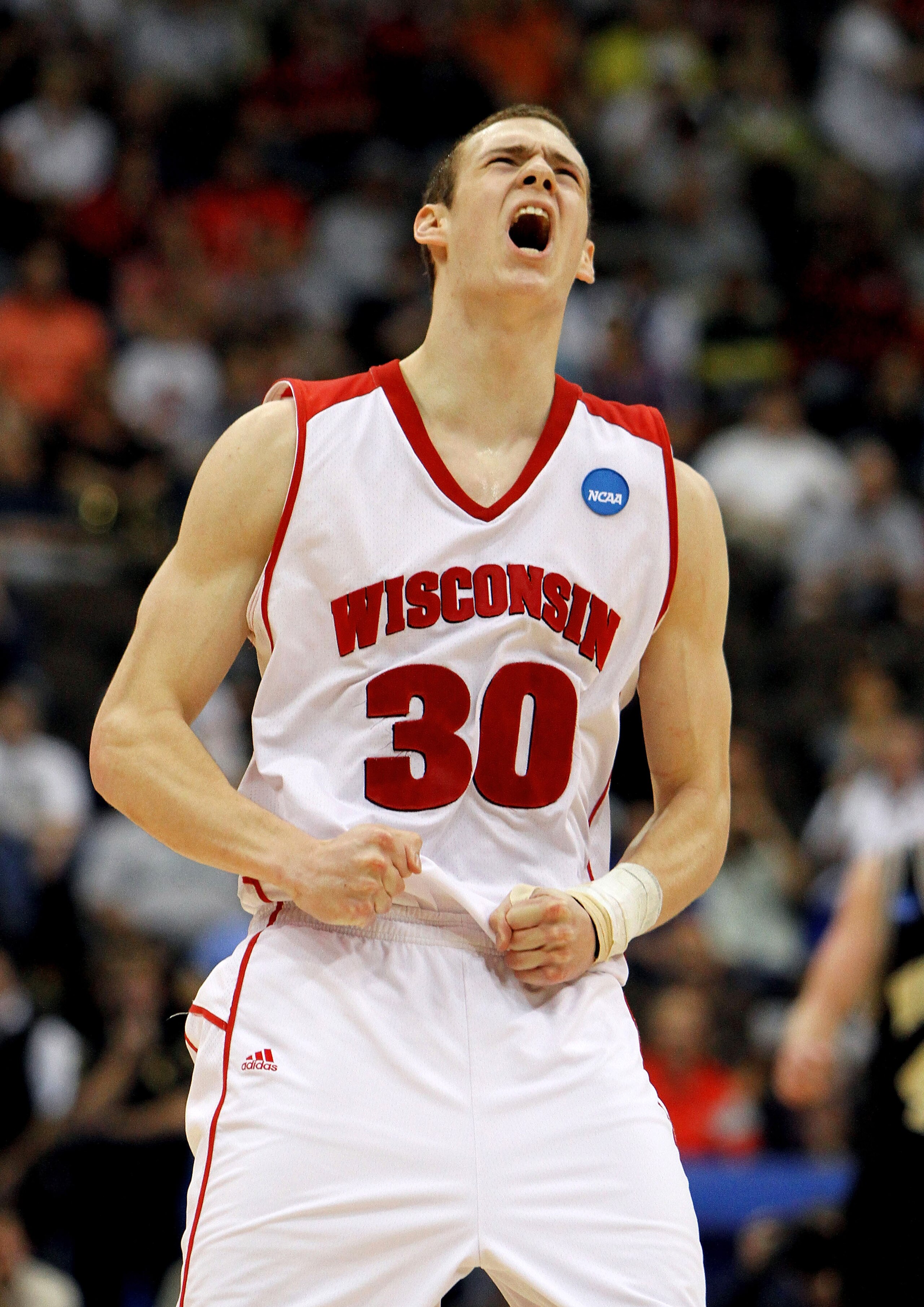 JACKSONVILLE, FL - MARCH 19:  Jon Leuer #30 of the Wisconsin Badgers celebrates after hitting a shot in the second half against the Wofford Terriers during the first round of the 2010 NCAA men's basketball tournament at Jacksonville Veteran's Memorial Are