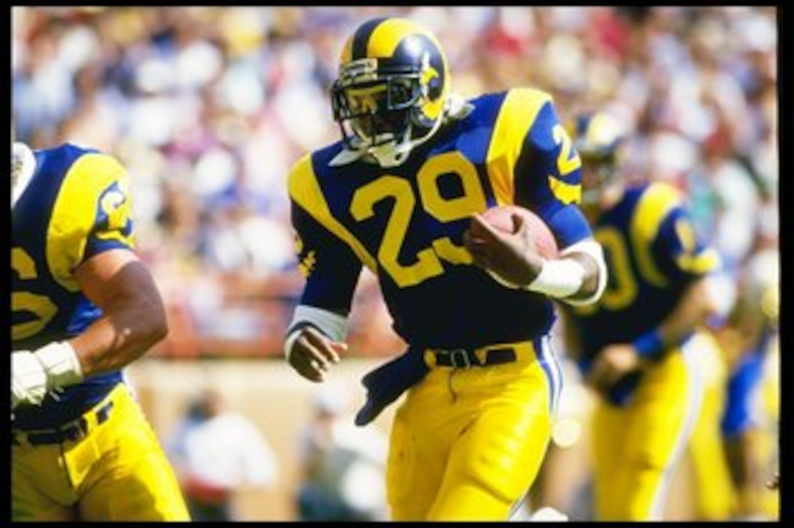 19 Oct 1986:  Running back Eric Dickerson of the Los Angeles Rams moves the ball during a game against the Detroit Lions at Anaheim Stadium in Anaheim, California.  The Rams won the game, 14-10. Mandatory Credit: Mike Powell  /Allsport