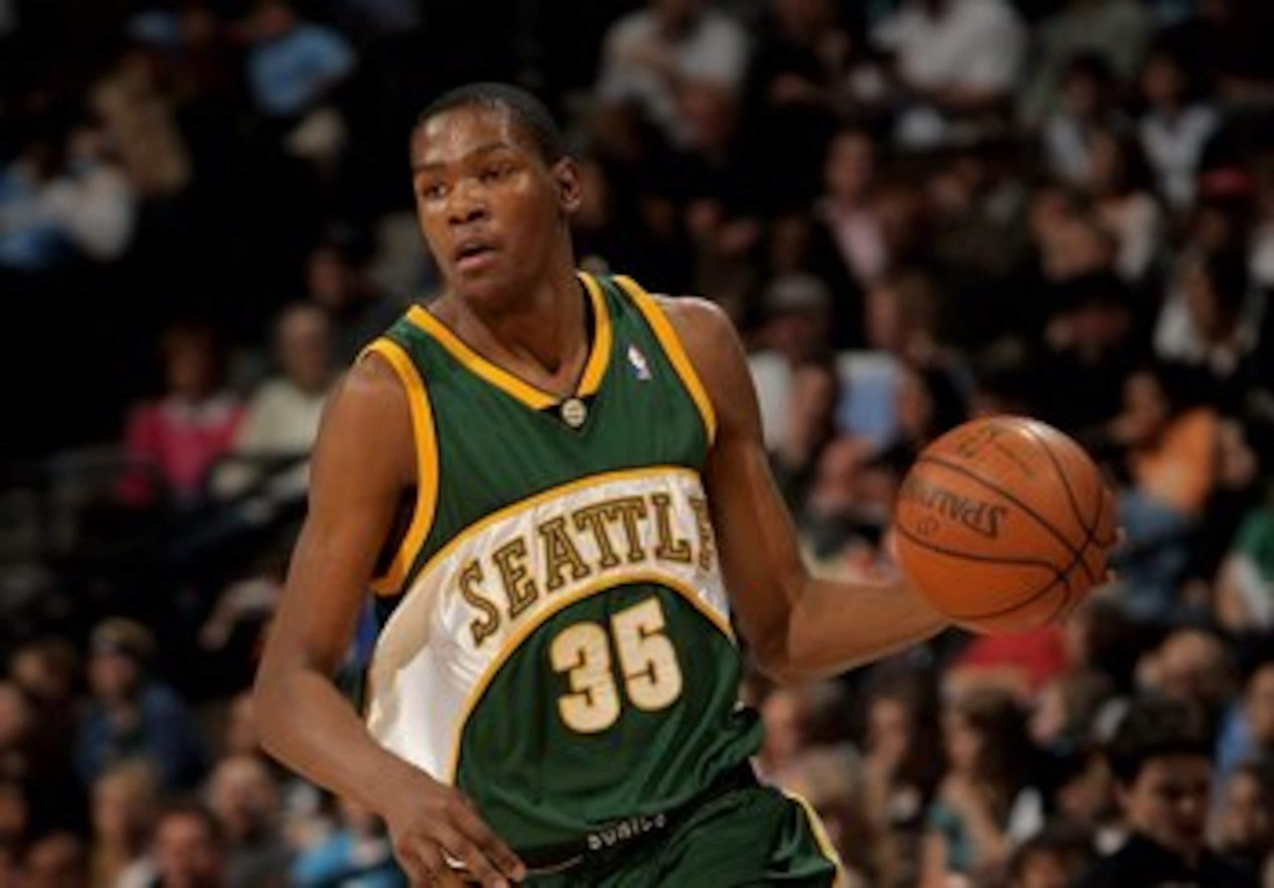 DENVER - MARCH 16:  Kevin Durant #35 of the Seattle SuperSonics controls the ball against the Denver Nuggets at the Pepsi Center on March 16, 2008 in Denver, Colorado. The Nuggets defeated the Sonics 168-116. NOTE TO USER: User expressly acknowledges and