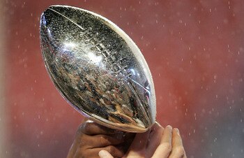 MIAMI GARDENS, FL - FEBRUARY 04:  Members of the of the Indianapolis Colts celebrate with the Vince Lonbardi Trophy after their 29-17 win the Chicago Bears in Super Bowl XLI on February 4, 2007 at Dolphin Stadium in Miami Gardens, Florida.  (Photo by Jona
