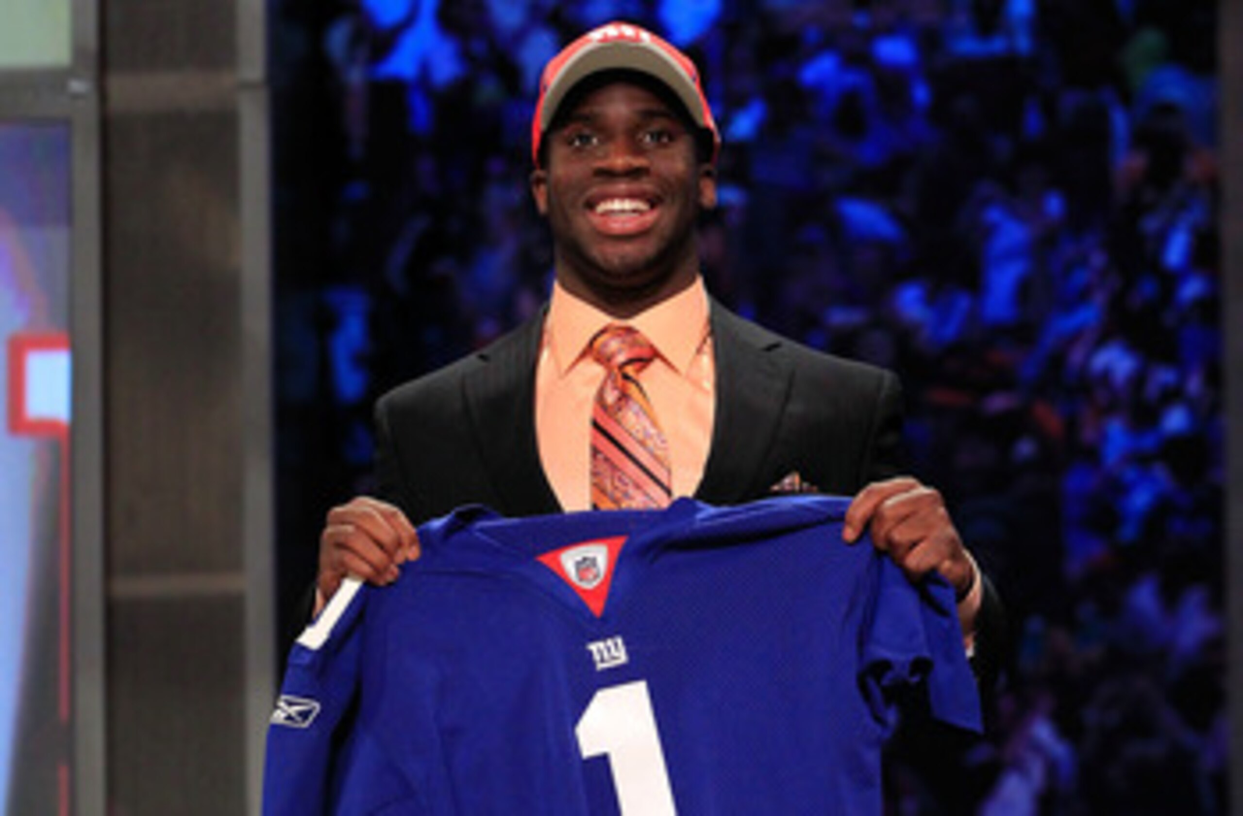 NEW YORK, NY - APRIL 28:  Prince Amukamara, #19 overall pick by the New York Giants, holds up a jersey on stage during the 2011 NFL Draft at Radio City Music Hall on April 28, 2011 in New York City.  (Photo by Chris Trotman/Getty Images)
