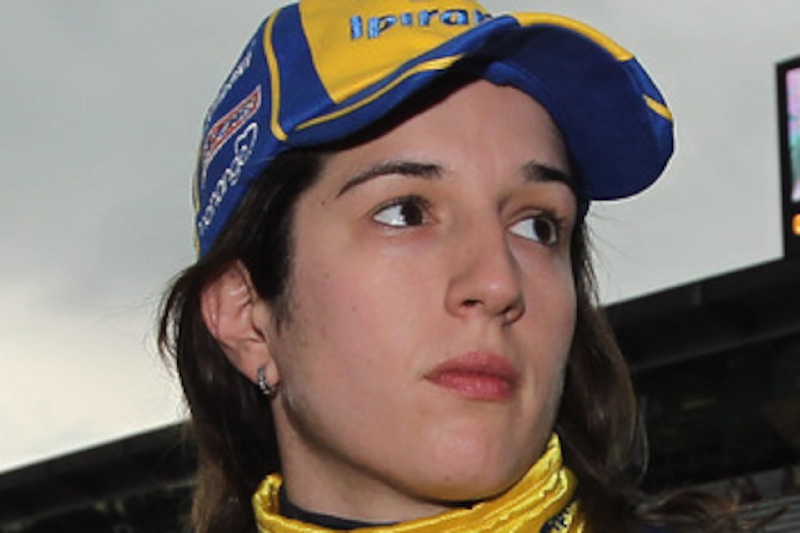 INDIANAPOLIS, IN - MAY 22:  Ana Beatriz of Brazil, driver of the #24 Team Ipiranga/Dreyer & Reinbold Racing Dallara Honda, looks to the scoreboard after qualifying for the Indianapolis 500 on May 22, 2011 at Indianapolis Motor Speedway in Indianapolis, In
