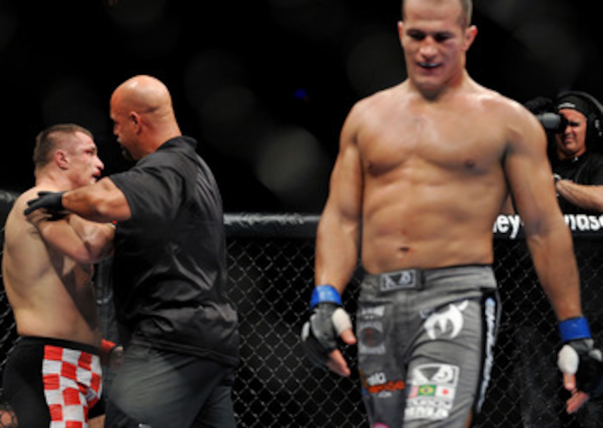 DALLAS - SEPTEMBER 19:  UFC fighter Mirko Cro Cop (L) is stopped by referee after losing to opponent UFC fighter Junior Dos Santo (R) during their Heavyweight bout at UFC 103: Franklin vs. Belfort at the American Airlines Center on September 19, 2009 in D