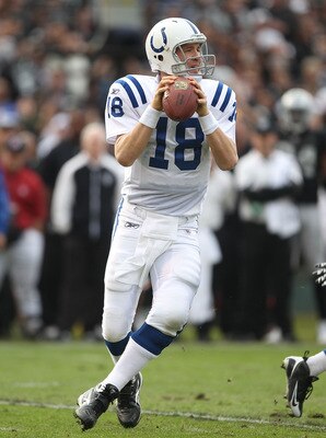 OAKLAND, CA - DECEMBER 26:  Peyton Manning #18 of the Indianapolis Colts passes against the Oakland Raiders during an NFL game at Oakland-Alameda County Coliseum on December  26, 2010 in Oakland, California.  (Photo by Jed Jacobsohn/Getty Images)