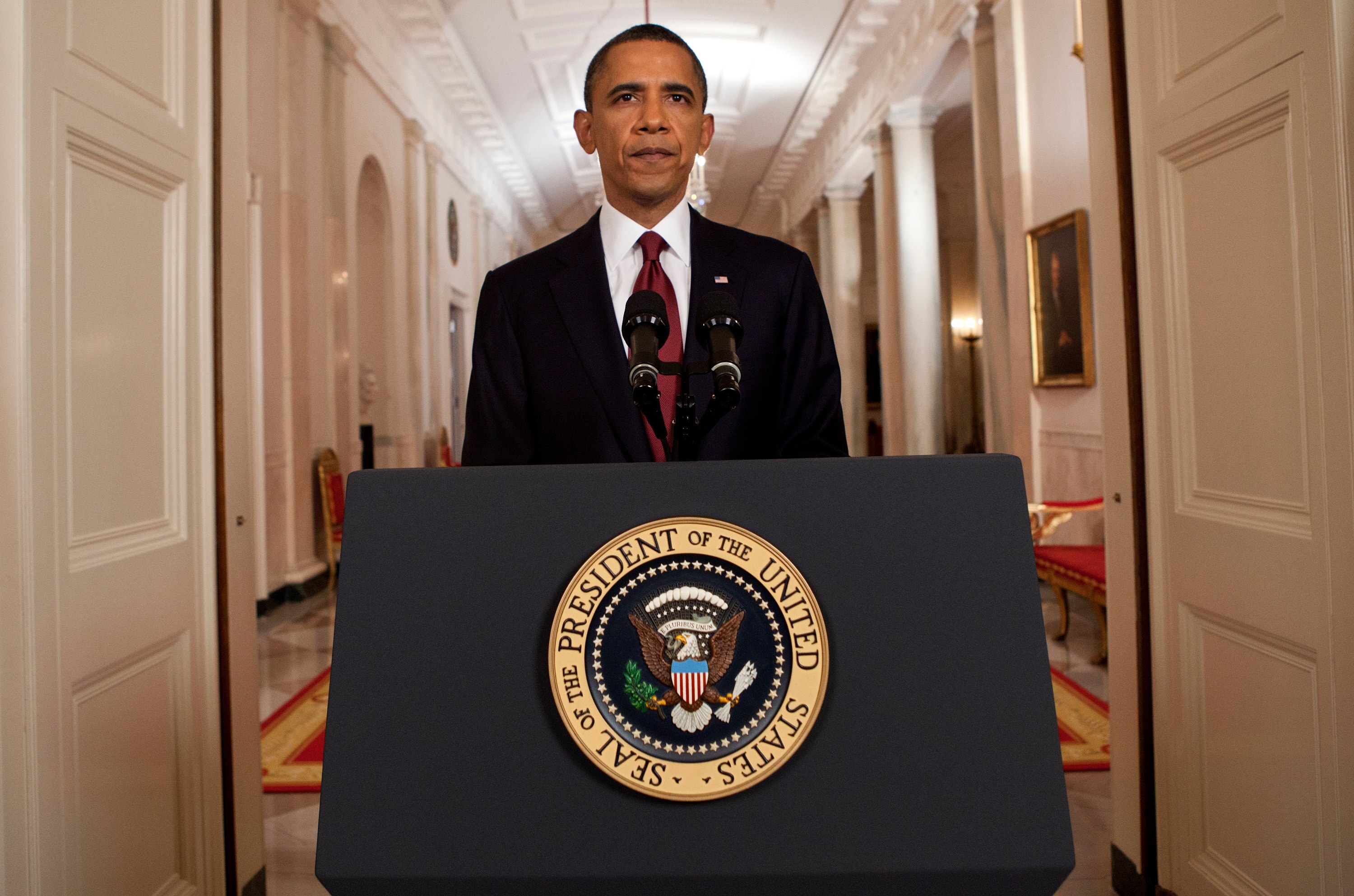 WASHINGTON, DC - MAY 1:  (AFP OUT) U.S. President Barack Obama stands after addressing the nation on TV from the East Room of the White House to make a televised statement May 1, 2011 in Washington, DC.  Bin Laden has been killed near Islamabad, Pakistan