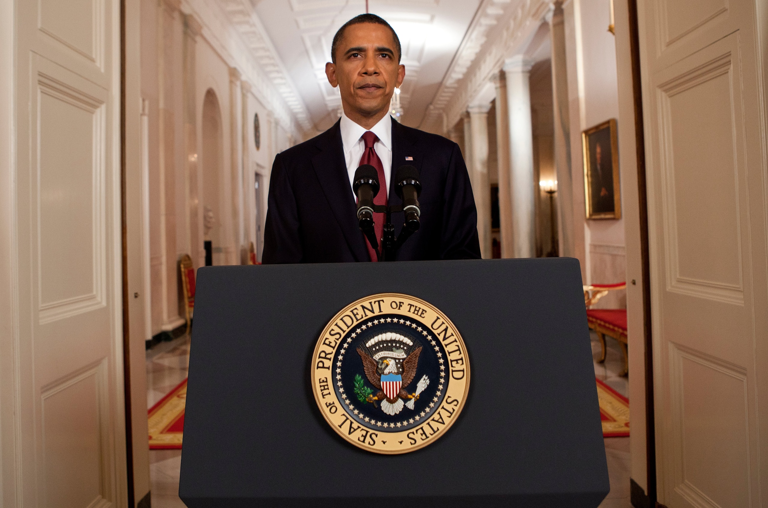 WASHINGTON, DC - MAY 1:  (AFP OUT) U.S. President Barack Obama stands after addressing the nation on TV from the East Room of the White House to make a televised statement May 1, 2011 in Washington, DC.  Bin Laden has been killed near Islamabad, Pakistan