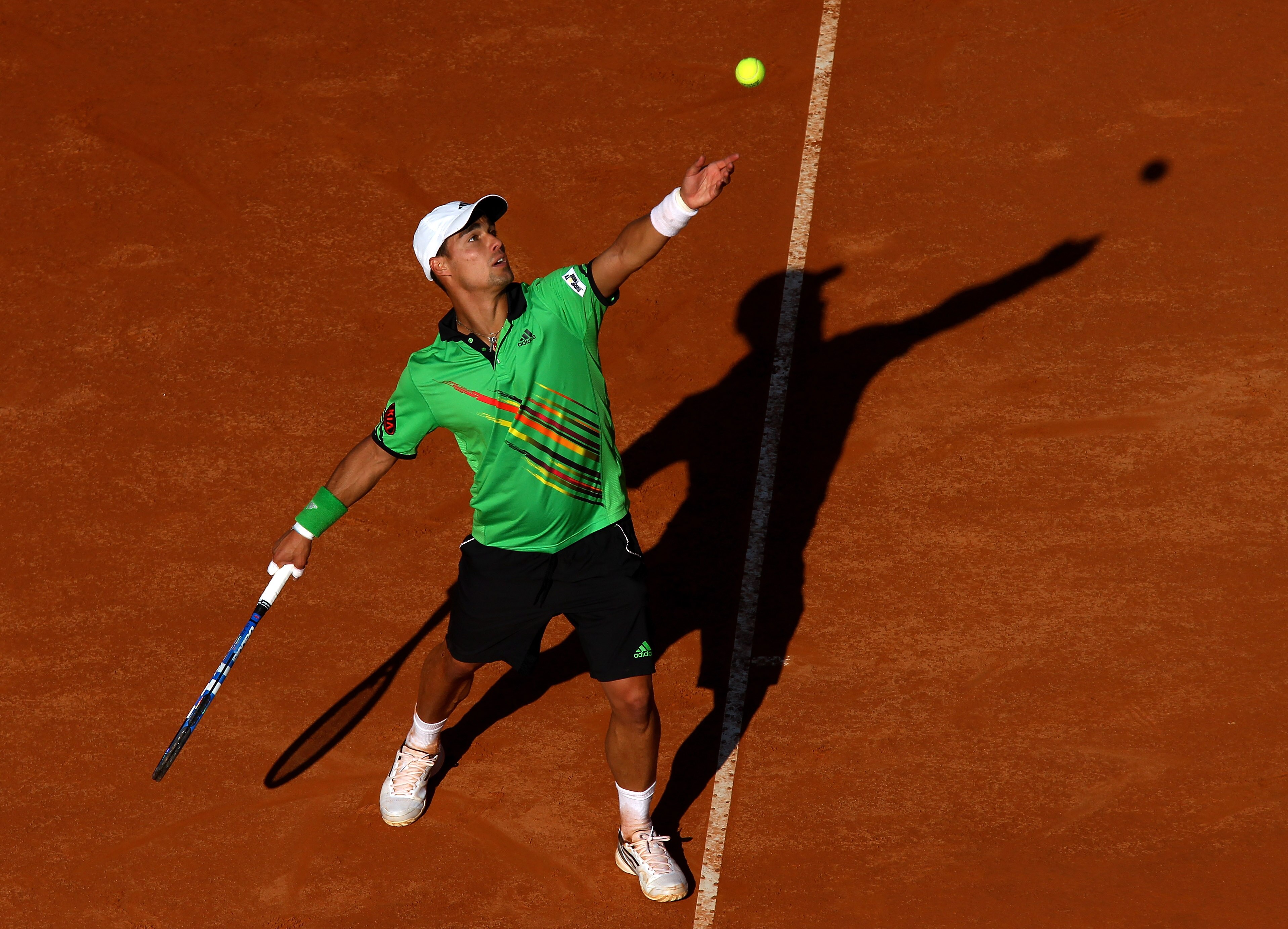 ROME, ITALY - MAY 10: Fabio Fognini of Italy serves during his first round match against Stanislav Wawrinka of Switzerland during day three of the Internazionali BNL d'Italia at the Foro Italico Tennis Centre on May 10, 2011 in Rome, Italy. (Photo by Al ROME, ITALY - MAY 10: Fabio Fognini of Italy serves during his first round match against Stanislav Wawrinka of Switzerland during day three of the Internazionali BNL d'Italia at the Foro Italico Tennis Centre on May 10, 2011 in Rome, Italy. (Photo by Al