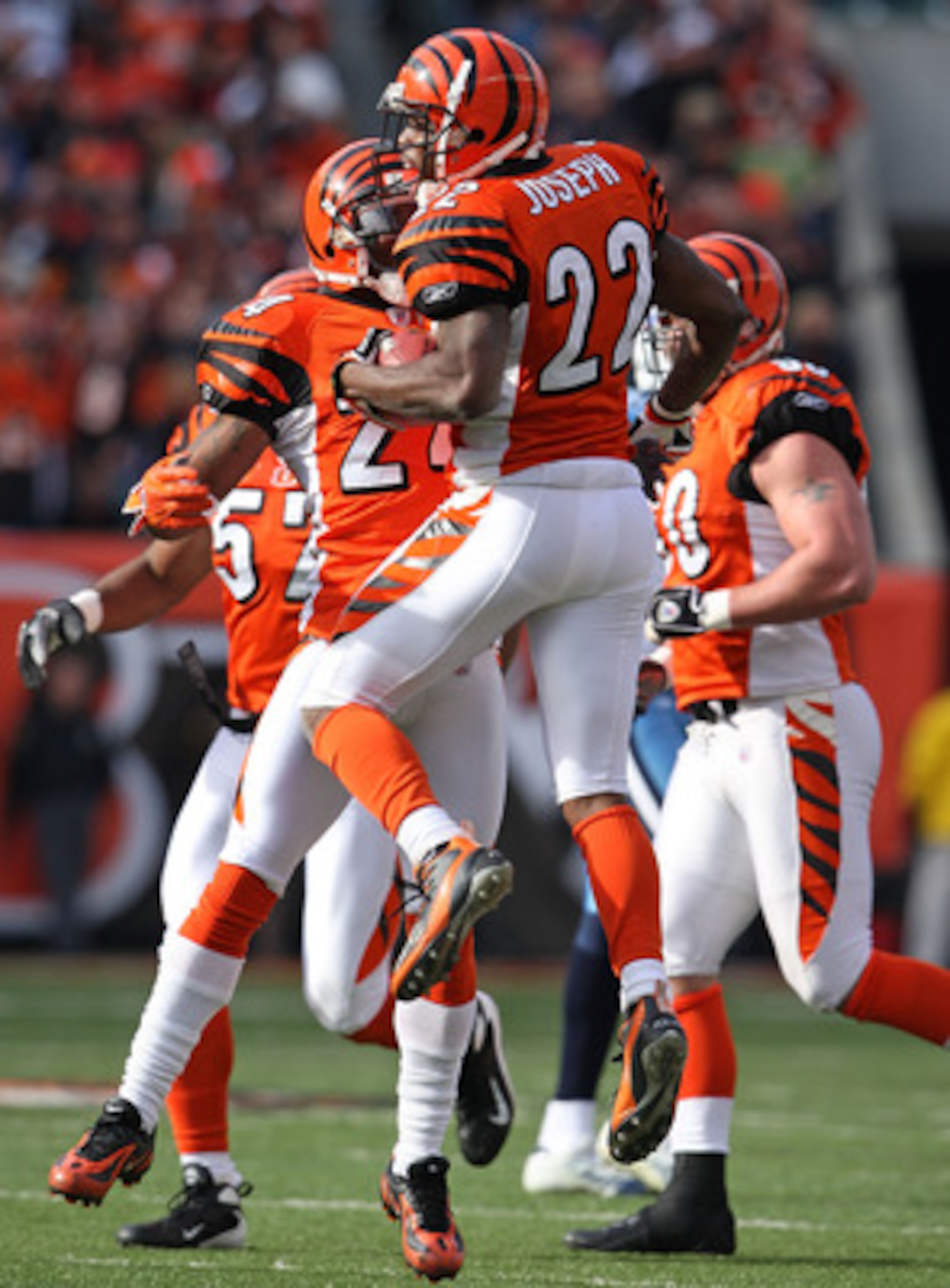 CINCINNATI - NOVEMBER 25:  Johnathan Joseph #22 of the Cincinnati Bengals celebrates with Deltha O'Neal #24 after Joseph intercepted a pass at Paul Brown Stadium November 25, 2007 in Cincinnati, Ohio.  (Photo by Andy Lyons/Getty Images)