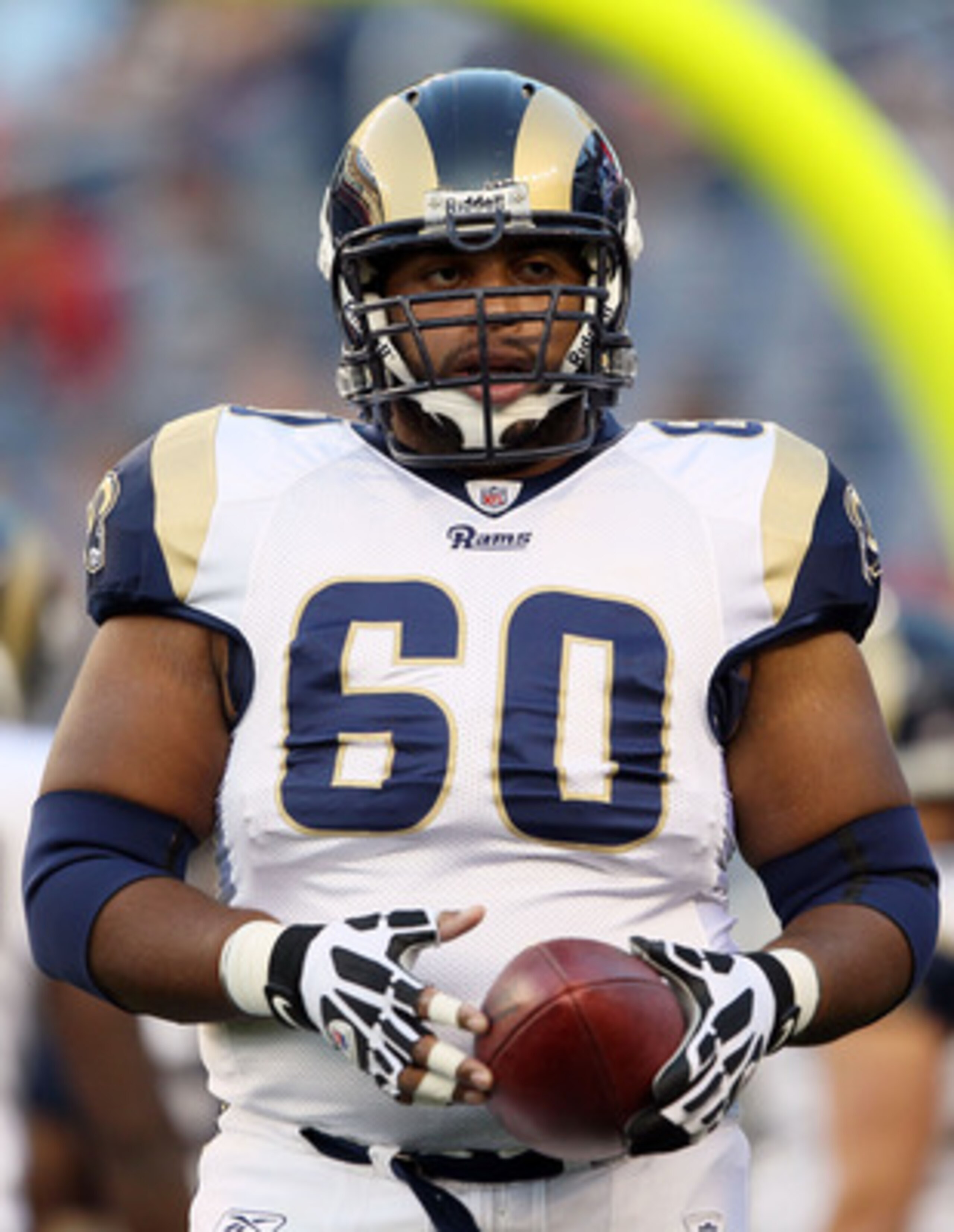 FOXBORO, MA - AUGUST 26:  Jason Brown #60 of the St. Louis Rams runs through a drill during warmups before the game against the New England Patriots on August 26, 2010 at Gillette Stadium in Foxboro, Massachusetts.  (Photo by Elsa/Getty Images)
