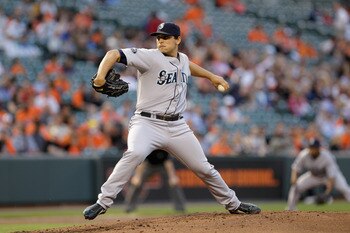 BALTIMORE, MD - MAY 12:  Starting pitcher Jason Vargas #38 of the Seattle Mariners delivers to a Baltimore Orioles batter at Oriole Park at Camden Yards on May 12, 2011 in Baltimore, Maryland.  (Photo by Rob Carr/Getty Images)