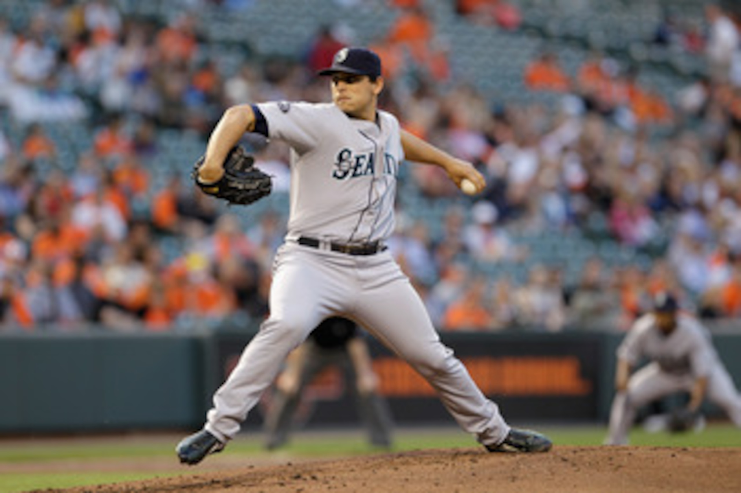 BALTIMORE, MD - MAY 12:  Starting pitcher Jason Vargas #38 of the Seattle Mariners delivers to a Baltimore Orioles batter at Oriole Park at Camden Yards on May 12, 2011 in Baltimore, Maryland.  (Photo by Rob Carr/Getty Images)