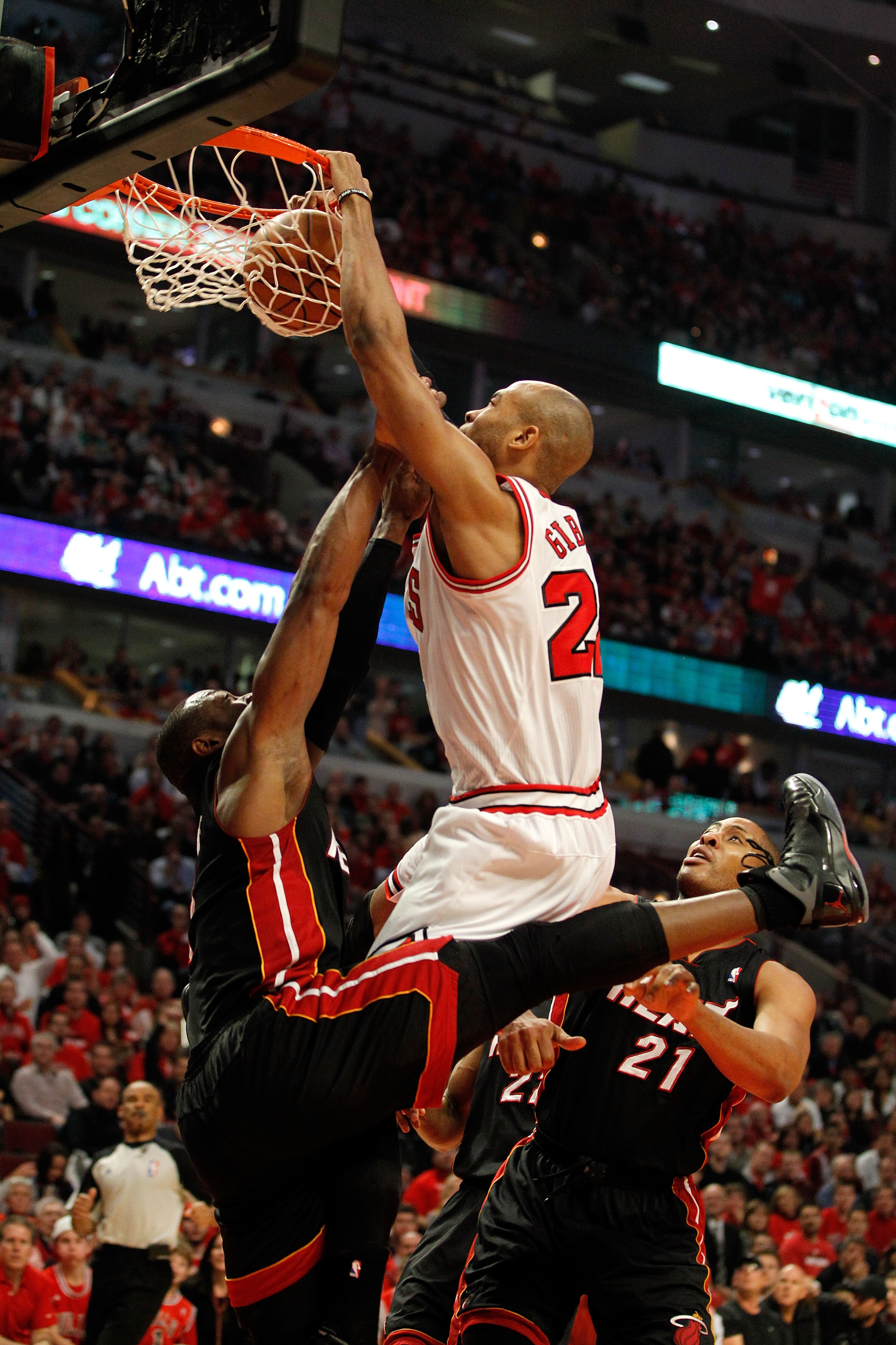 CHICAGO, IL - MAY 15:  Taj Gibson #22 of the Chicago Bulls dunks against Dwyane Wade #3 of the Miami Heat in Game One of the Eastern Conference Finals during the 2011 NBA Playoffs on May 15, 2011 at the United Center in Chicago, Illinois. The Bulls won 10