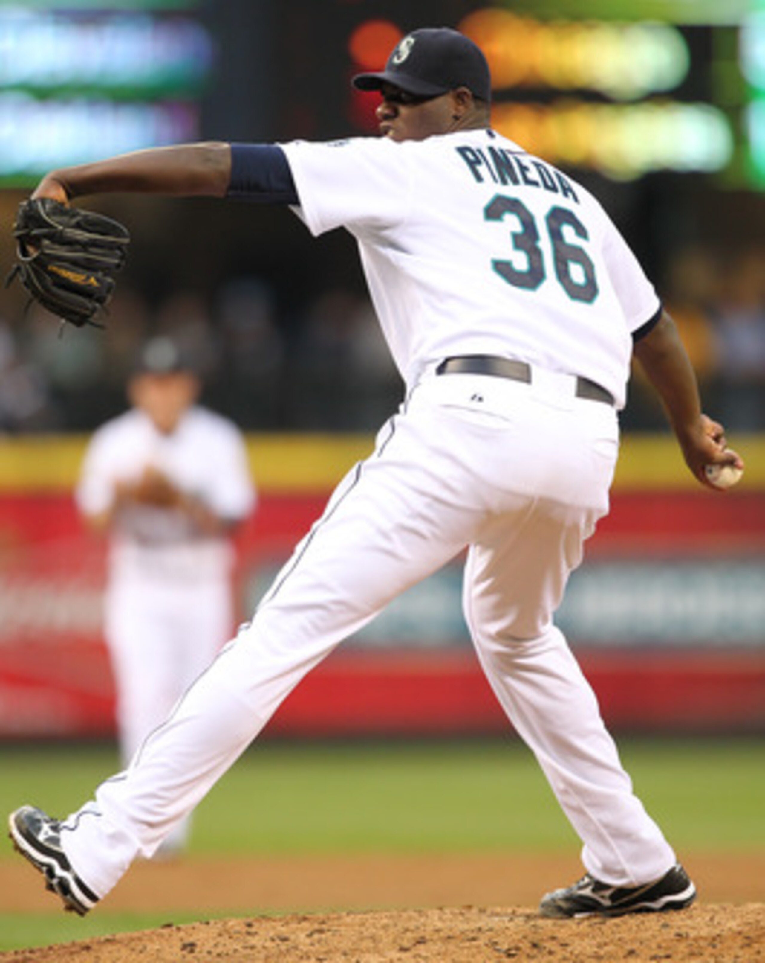 SEATTLE - MAY 04:  Starting pitcher Michael Pineda #36 of the Seattle Mariners pitches against the Texas Rangers at Safeco Field on May 4, 2011 in Seattle, Washington. (Photo by Otto Greule Jr/Getty Images)