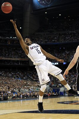 HOUSTON, TX - APRIL 04:  Kemba Walker #15 of the Connecticut Huskies goes to the basket against of the Butler Bulldogs during the National Championship Game of the 2011 NCAA Division I Men's Basketball Tournament at Reliant Stadium on April 4, 2011 in Hou