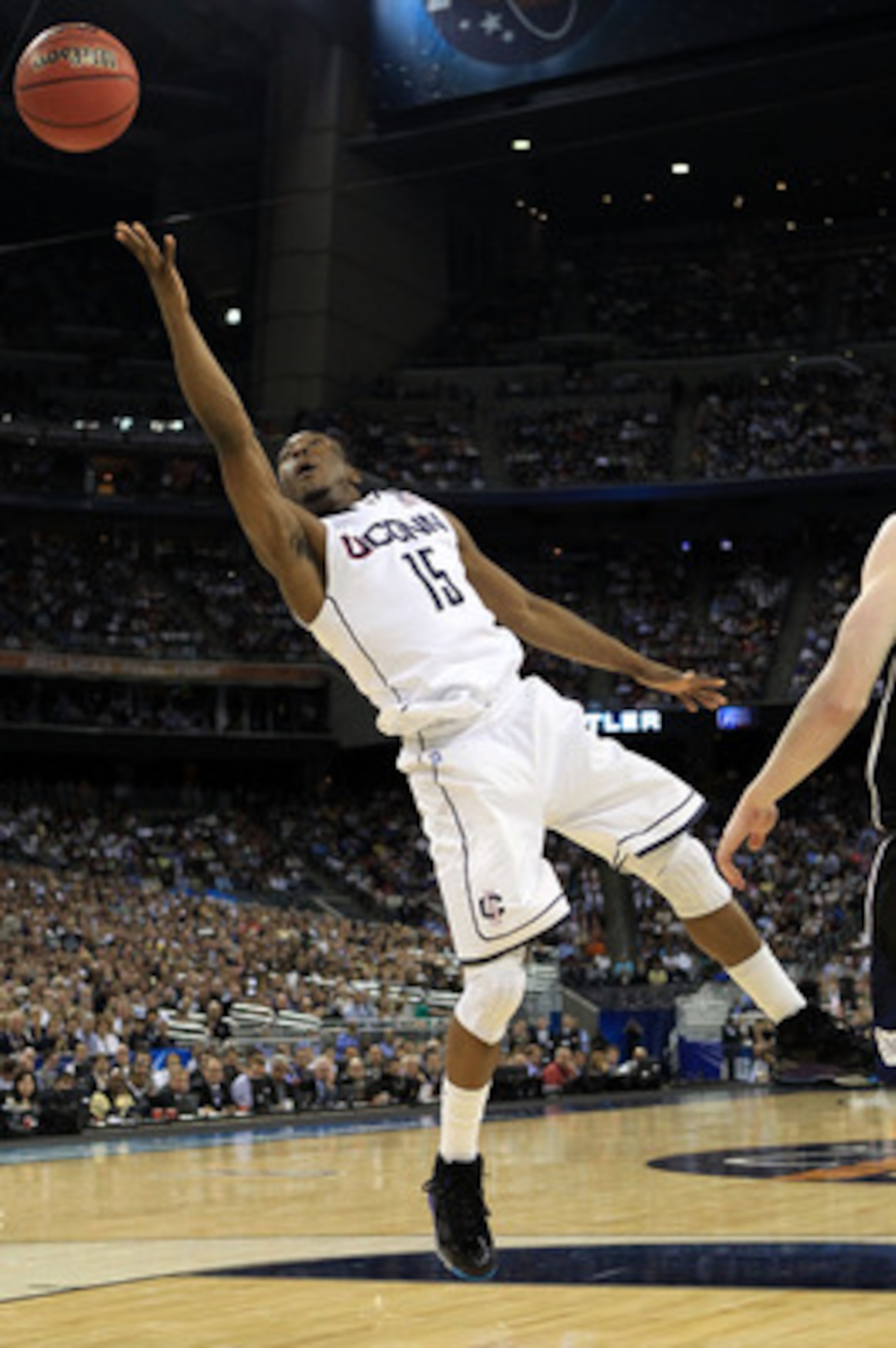 HOUSTON, TX - APRIL 04:  Kemba Walker #15 of the Connecticut Huskies goes to the basket against of the Butler Bulldogs during the National Championship Game of the 2011 NCAA Division I Men's Basketball Tournament at Reliant Stadium on April 4, 2011 in Hou