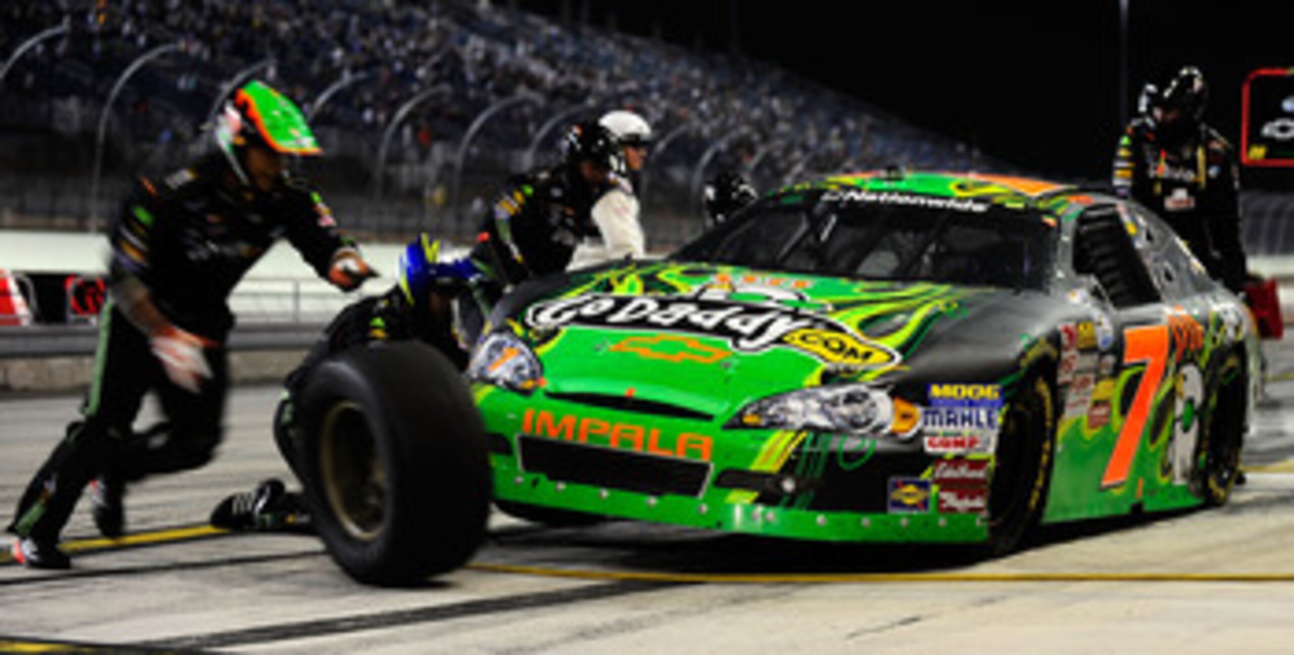 HOMESTEAD, FL - NOVEMBER 20:  Danica Patrick, driver of the #7 GoDaddy.com Chevrolet, makes a pit stop during the NASCAR Nationwide Series Ford 300 at Homestead-Miami Speedway on November 20, 2010 in Homestead, Florida.  (Photo by Rusty Jarrett/Getty Imag