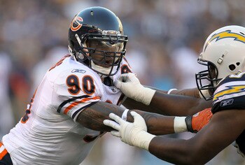 SAN DIEGO - AUGUST 14:  Defensive end Julius Peppers #90 of the Chicago Bears battles offensive guard Tyronne Green #69 of the San Diego Chargers on August 14, 2010 at Qualcomm Stadium in San Diego, California.  (Photo by Stephen Dunn/Getty Images)