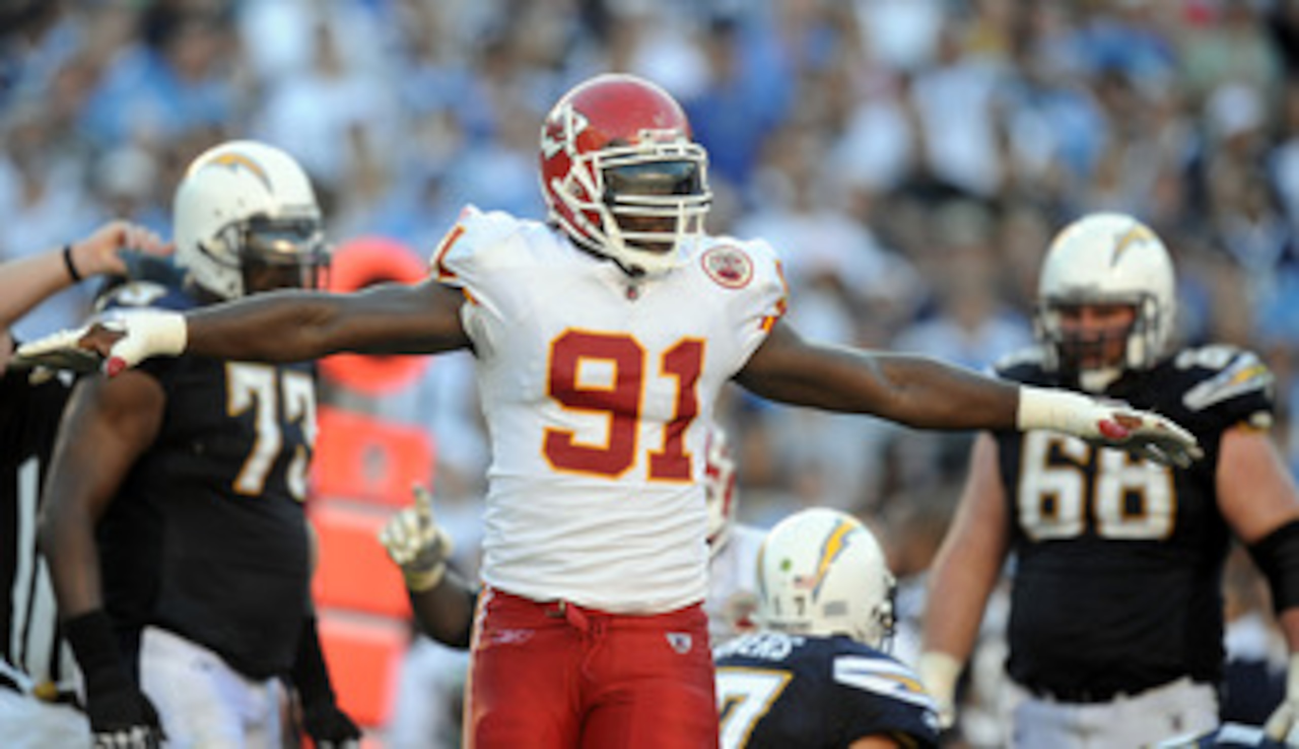 SAN DIEGO, CA - DECEMBER 12:  Tamba Hali #91 of the Kansas City Chiefs celebrates a stop on third down against the San Diego Chargers at Qualcomm Stadium on December 12, 2010 in San Diego, California.  (Photo by Harry How/Getty Images)