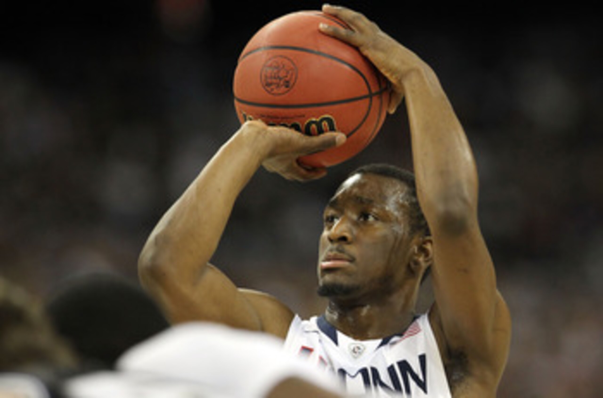HOUSTON, TX - APRIL 04:  Kemba Walker #15 of the Connecticut Huskies at the free throw line against the Butler Bulldogs during the National Championship Game of the 2011 NCAA Division I Men's Basketball Tournament at Reliant Stadium on April 4, 2011 in Ho