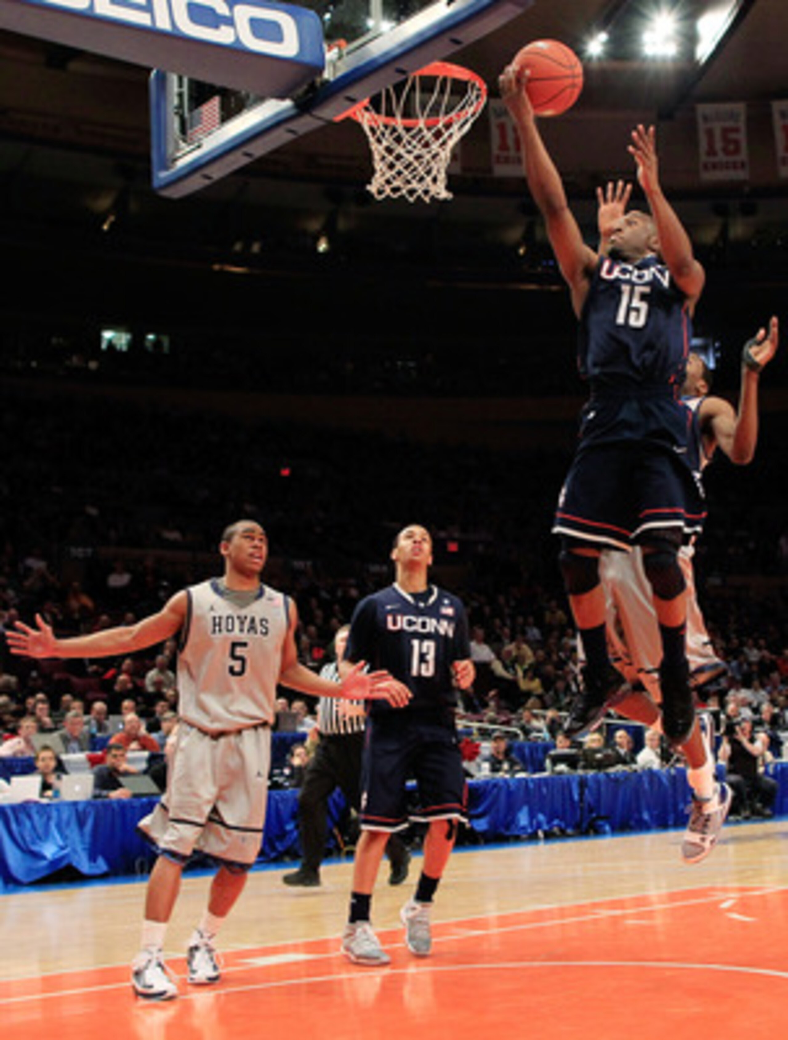 NEW YORK, NY - MARCH 09:  Kemba Walker #15 of the Connecticut Huskies lays the ball up against the Georgetown Hoyas during the second round of the 2011 Big East Men's Basketball Tournament presented by American Eagle Outfitters at Madison Square Garden on