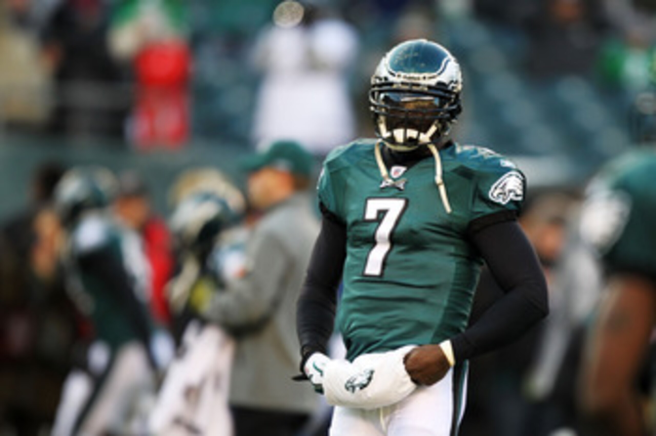 PHILADELPHIA, PA - JANUARY 09:  Michael Vick #7 of the Philadelphia Eagles walks on the field before playing against the Green Bay Packers in the 2011 NFC wild card playoff game at Lincoln Financial Field on January 9, 2011 in Philadelphia, Pennsylvania. 