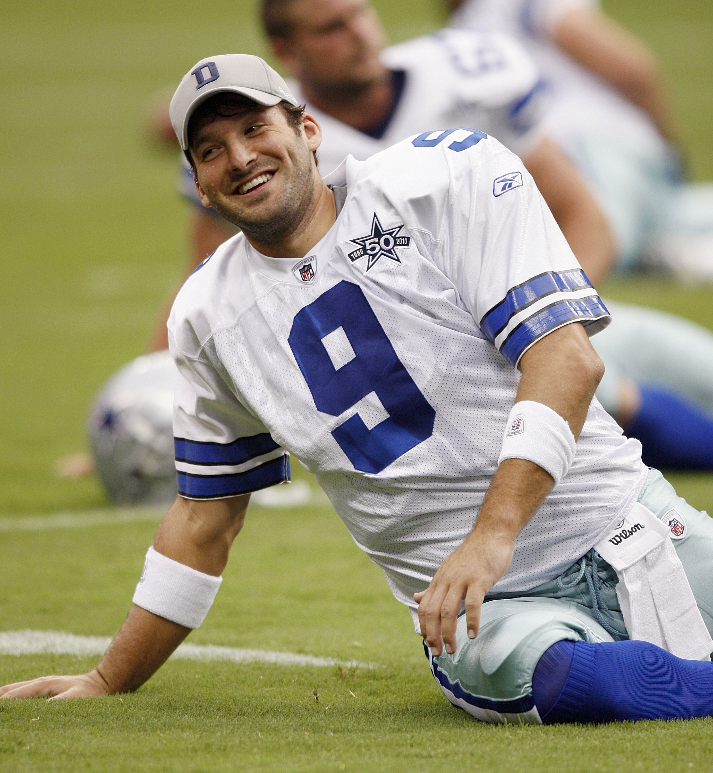HOUSTON - AUGUST 28:  Quarterback Tony Romo #9 of the Dallas Cowboys warmups before playing the Houston Texans in a preseason game at Reliant Stadium on August 28, 2010 in Houston, Texas.  (Photo by Bob Levey/Getty Images)