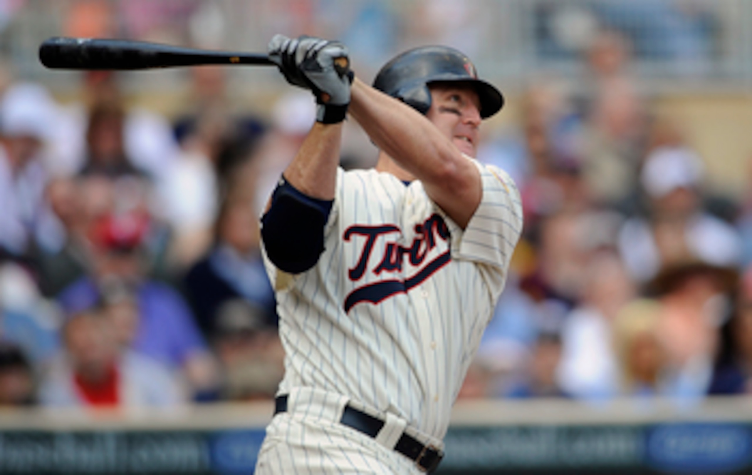 MINNEAPOLIS, MN - APRIL 24: Jim Thome #25 of the Minnesota Twins hits a double against the Cleveland Indians during the seventh inning of their game on April 24, 2011 at Target Field in Minneapolis, Minnesota. Twins defeated the Indians 4-3. (Photo by Han