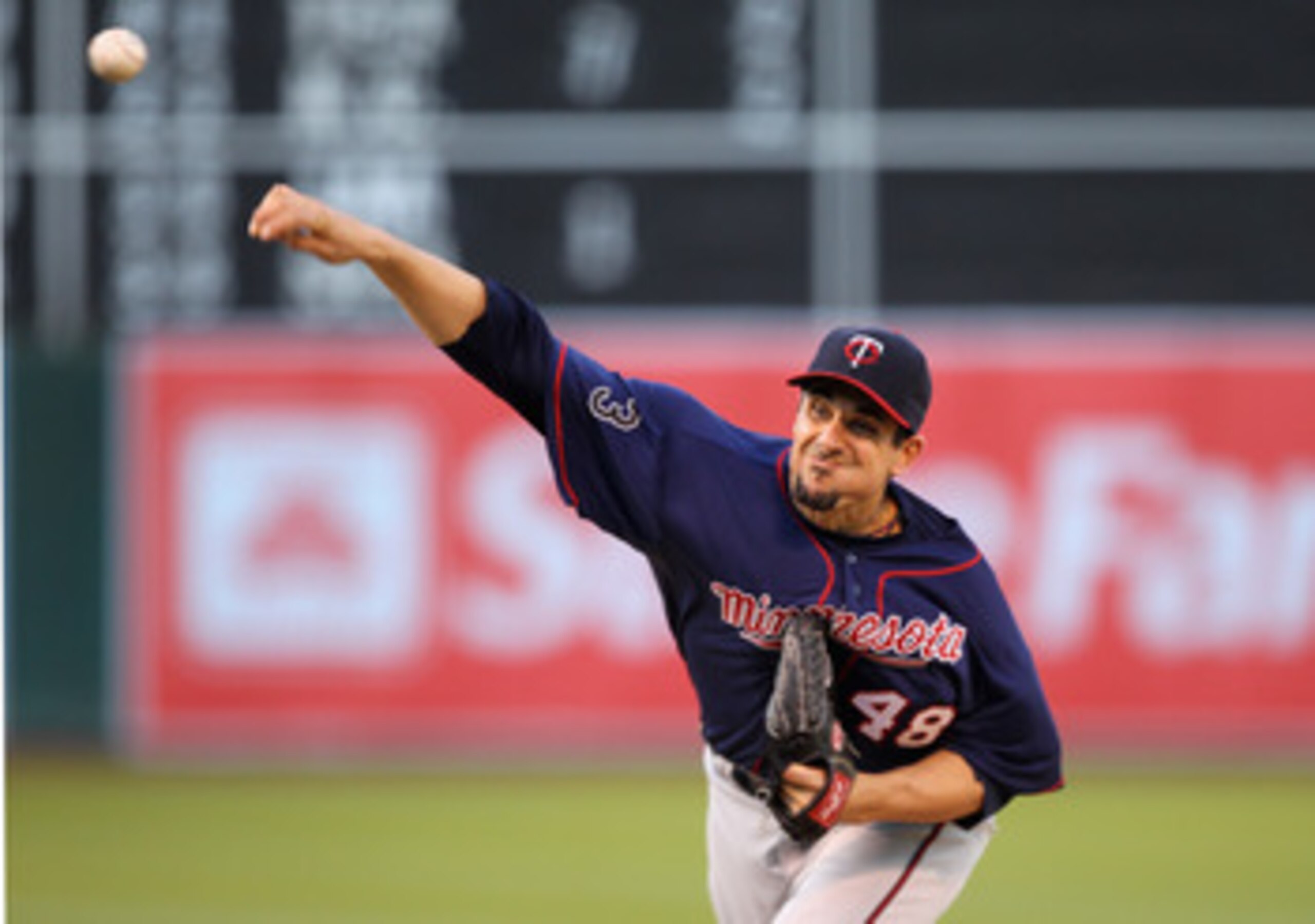OAKLAND, CA - MAY 18:  Carl Pavano #48 of the Minnesota Twins pitches against the Oakland Athletics at Oakland-Alameda County Coliseum on May 18, 2011 in Oakland, California.  (Photo by Ezra Shaw/Getty Images)