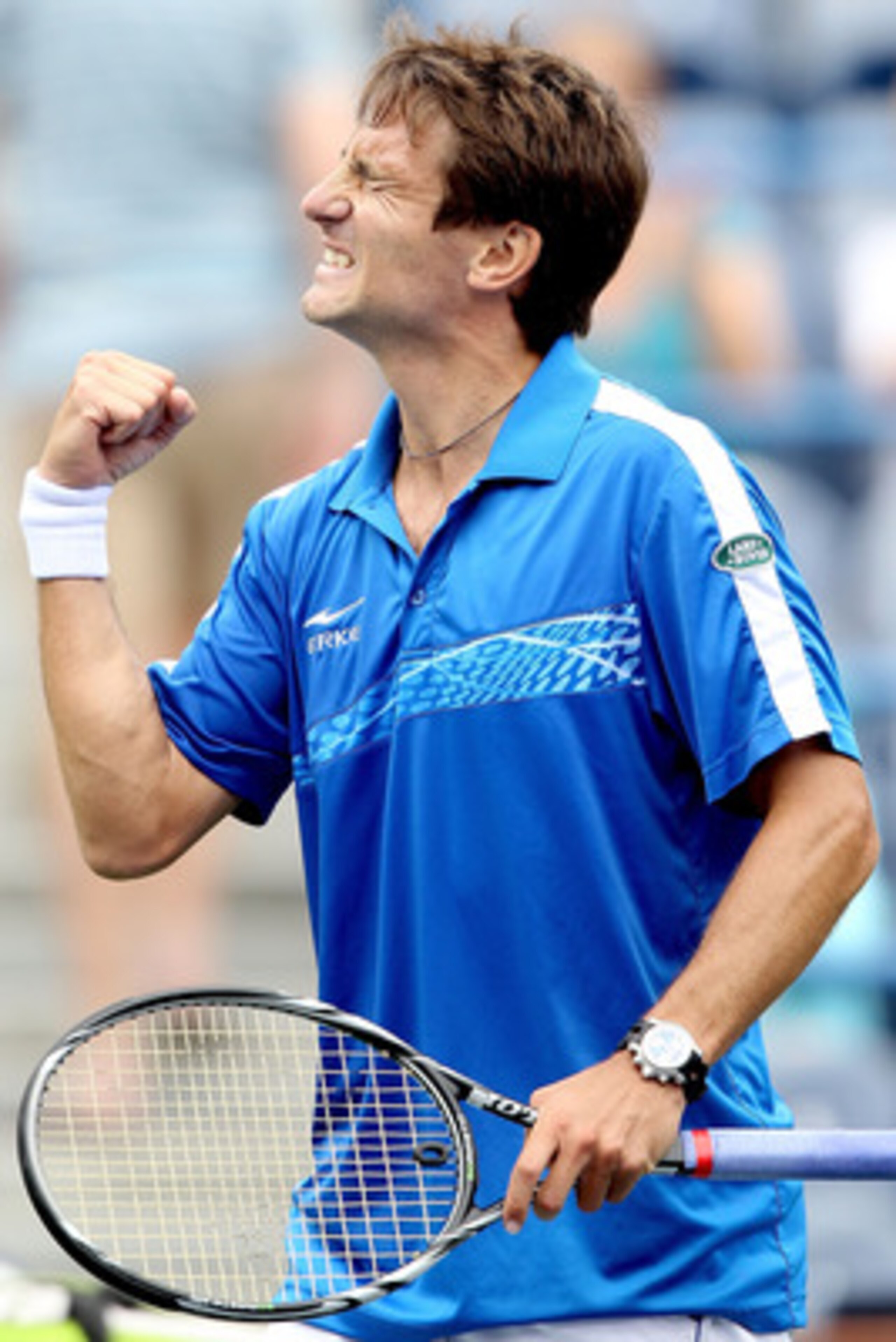 INDIAN WELLS, CA - MARCH 16:  Tommy Robredo of Spain celebrates his win over Sam Querrey during the BNP Paribas Open at the Indian Wells Tennis Garden on March 16, 2011 in Indian Wells, California.  (Photo by Matthew Stockman/Getty Images)