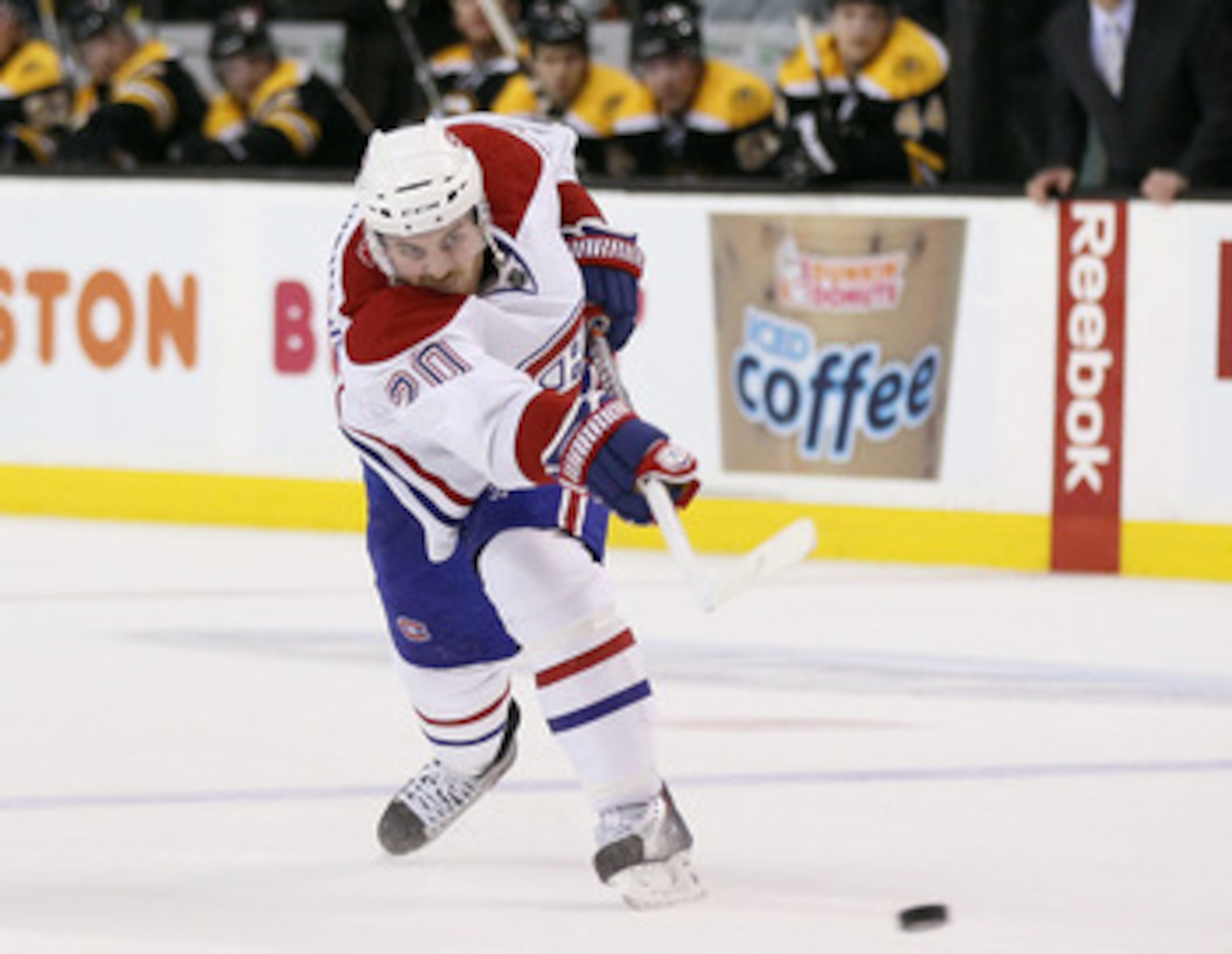 BOSTON, MA - FEBRUARY 09:  James Wisniewski #20 of the Montreal Canadiens takes a shot in the second period against the Boston Bruins on February 9, 2011 at the TD Garden in Boston, Massachusetts.  The Bruins defeated the Canadiens 8-6. (Photo by Elsa/Get