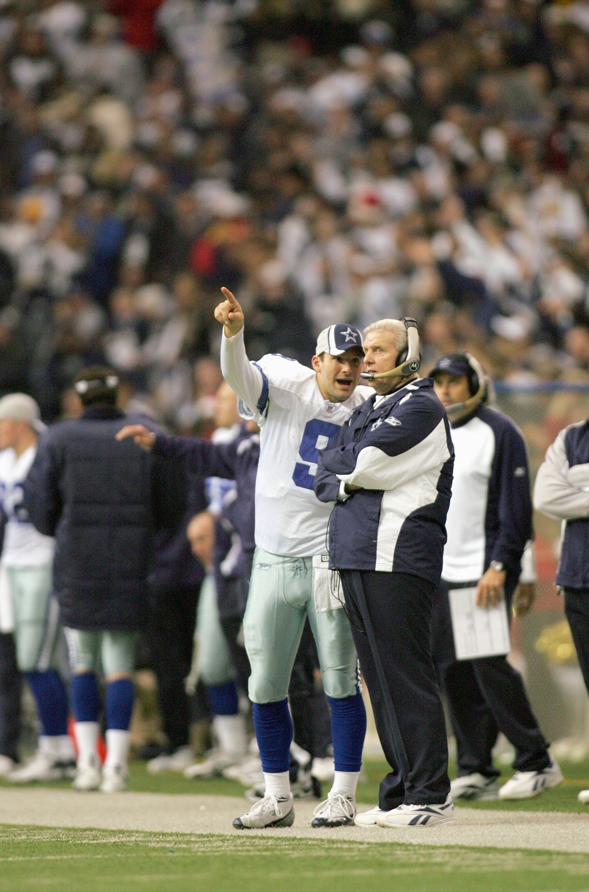 DALLAS - DECEMBER 10: Tony Romo #9 of the Dallas Cowboys talks to head coach Bill Parcells during the game against the New Orleans Saints at Texas Stadium on December 10, 2006 in Irving, Texas. (Photo by Ronald Martinez/Getty Images)