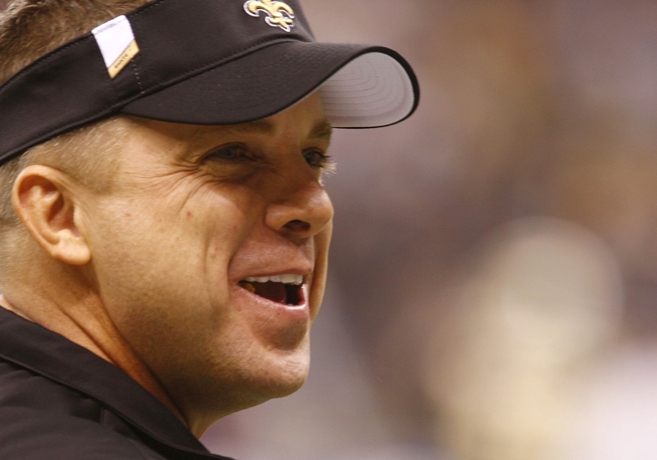 NEW ORLEANS - DECEMBER 19:  Head coach Sean Payton of the New Orleans Saints walks on the field prior to their game against the Dallas Cowboys at the Louisiana Superdome on December 19, 2009 in New Orleans, Louisiana. (Photo by Scott Halleran/Getty Images
