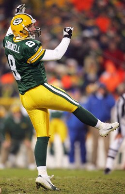 GREEN BAY, WI - NOVEMBER 29:  Ryan Longwell #8 of the Green Bay Packers kicks a field goal against the St. Louis Rams November 29, 2004 at Lambeau Field in Green Bay, Wisconsin. The Packers defeated the Rams 45-17.  (Photo by Matthew Stockman/Getty Images