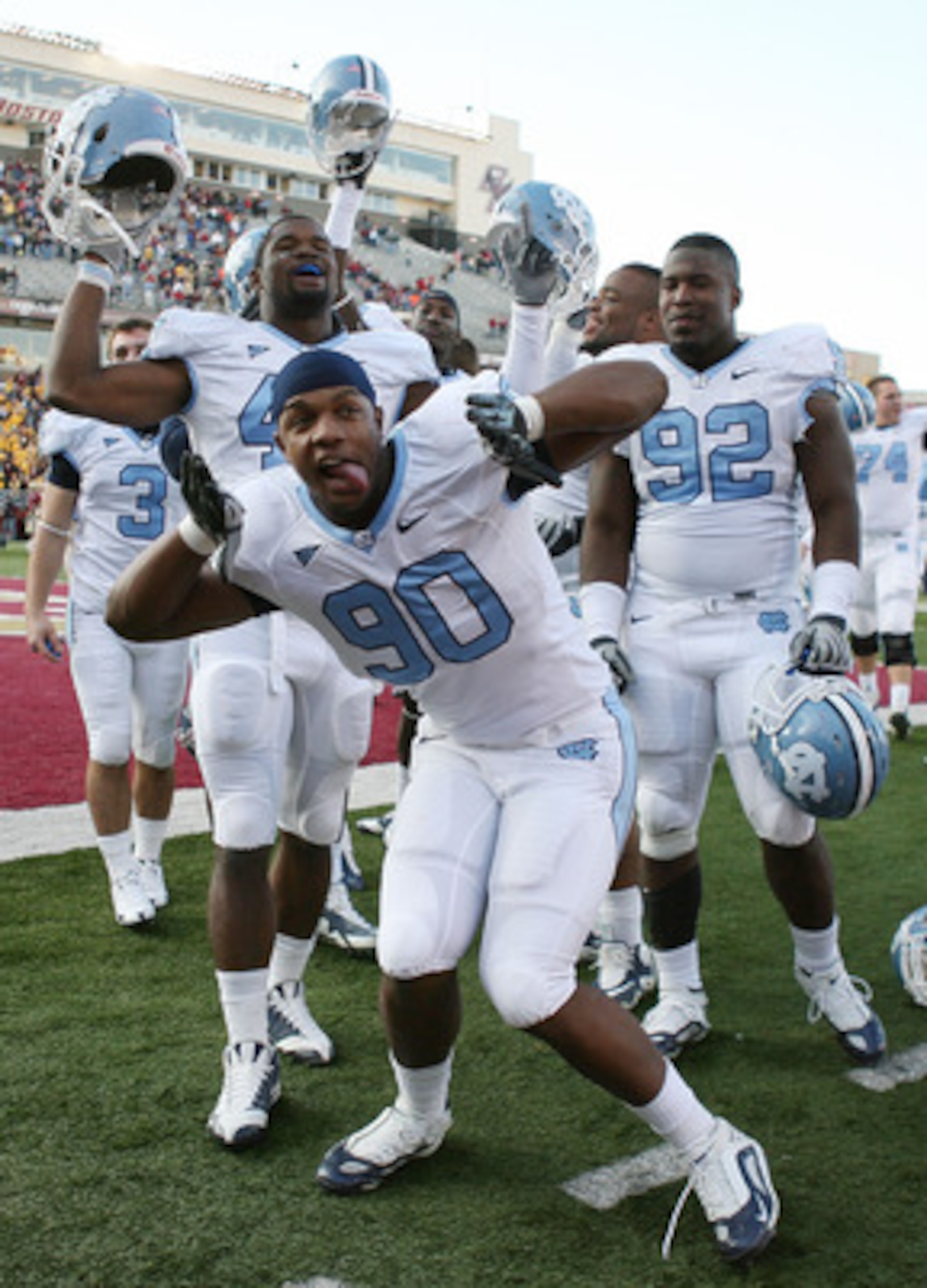 CHESTNUT HILL, MA - NOVEMBER 21:  Quinton Coples #90 of the North Carolina Tar Heels and the rest of his teammates celebrate the win over the Boston College Eagles on November 21, 2009 at Alumni Stadium in Chestnut Hill, Massachusetts. The Tar Heels defea