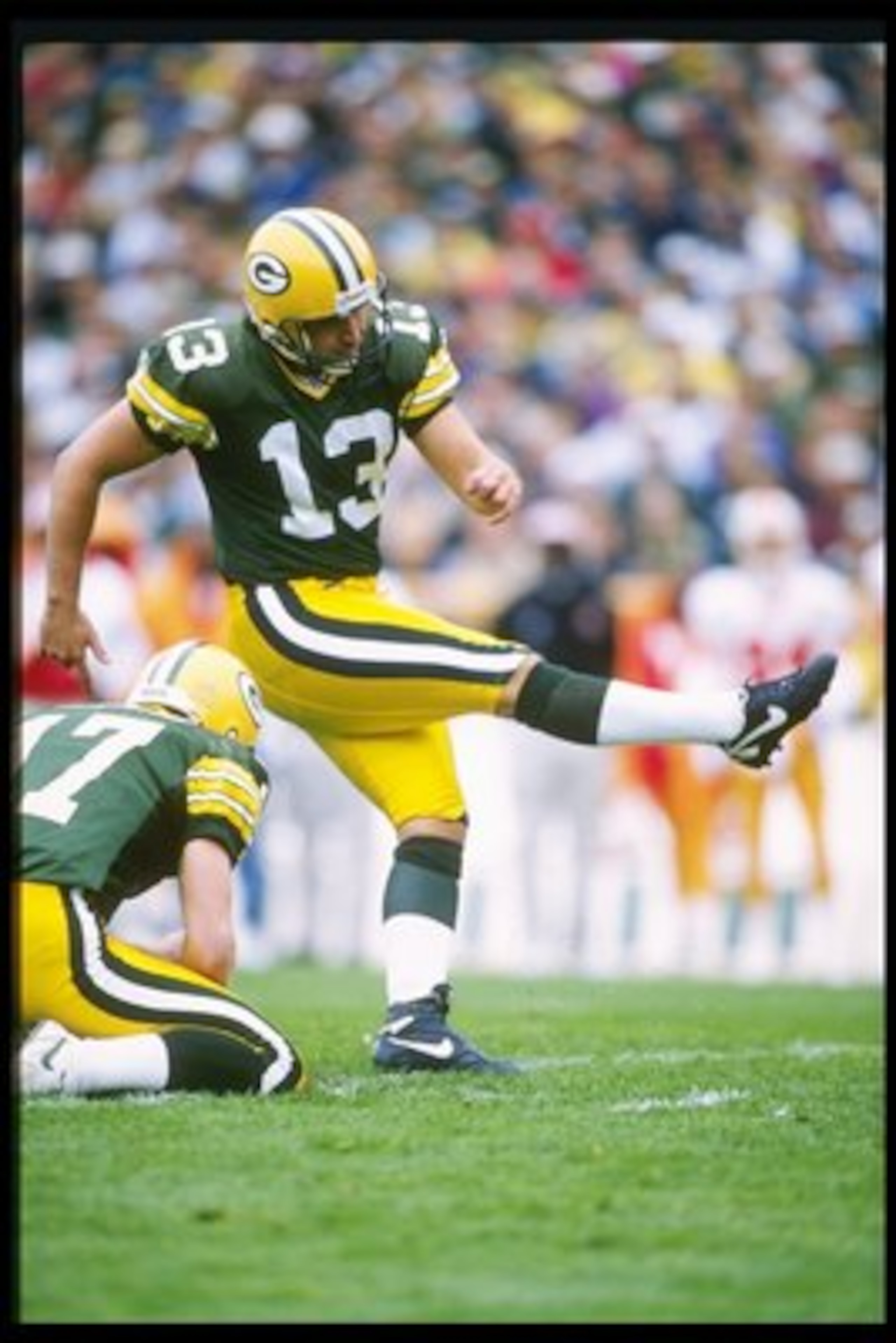 27 Oct 1996:  Kicker Chris Jacke of the Green Bay Packers kicks the ball during a game against the Tampa Bay Buccaneers at Lambeau Field in Green Bay, Wisconsin.  The Packers won the game, 13-7. Mandatory Credit: Jonathan Daniel  /Allsport