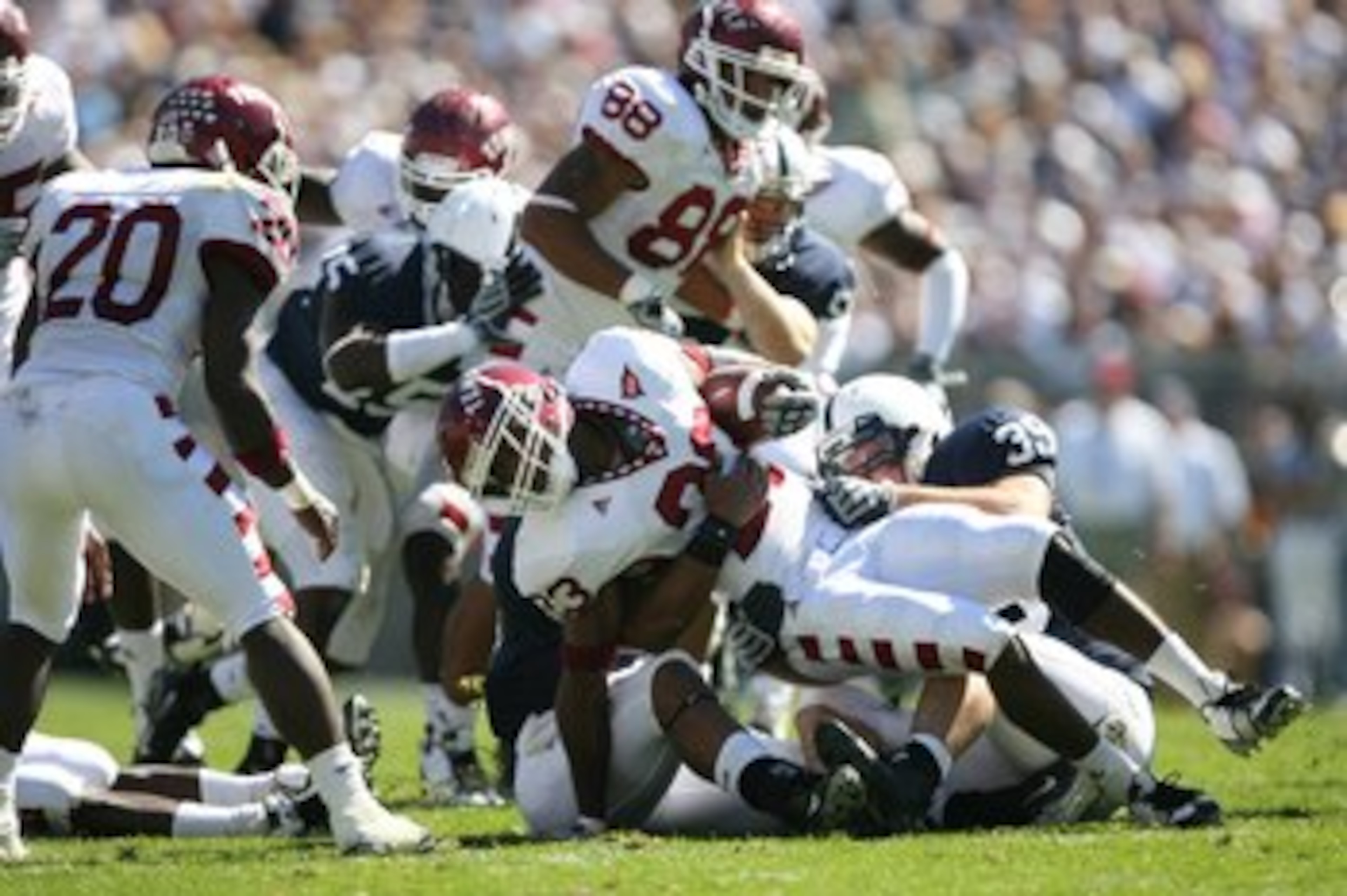 STATE COLLEGE, PA - SEPTEMBER 19: Wide receiver James Nixon #23 of the Temple Owls is tackled by defensive end Tom Golarz #39 of the Penn State Nittany Lions during a game on September 19, 2009 at Beaver Stadium in State College, Pennsylvania. (Photo by H