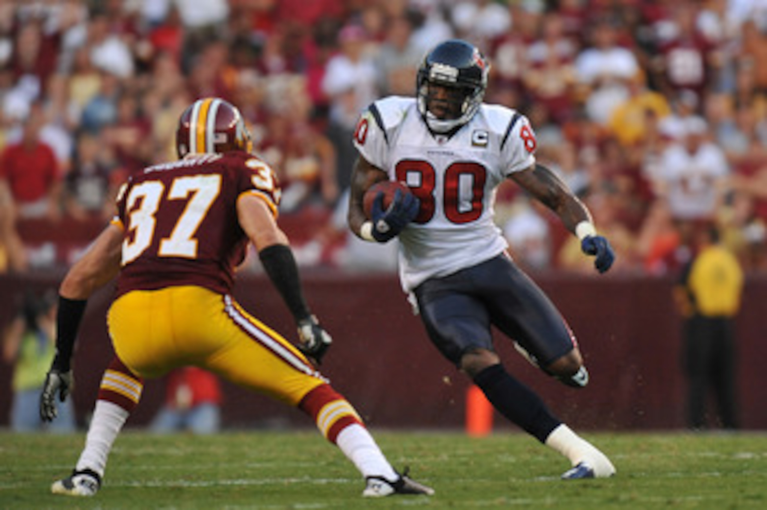 LANDOVER, MD - SEPTEMBER 19:  Andre Johnson #80 of the Houston Texans runs the ball against the Washington Redskins at FedExField on September 19, 2010 in Landover, Maryland. The Texans defeated the Redskins in overtime 30-27. (Photo by Larry French/Getty