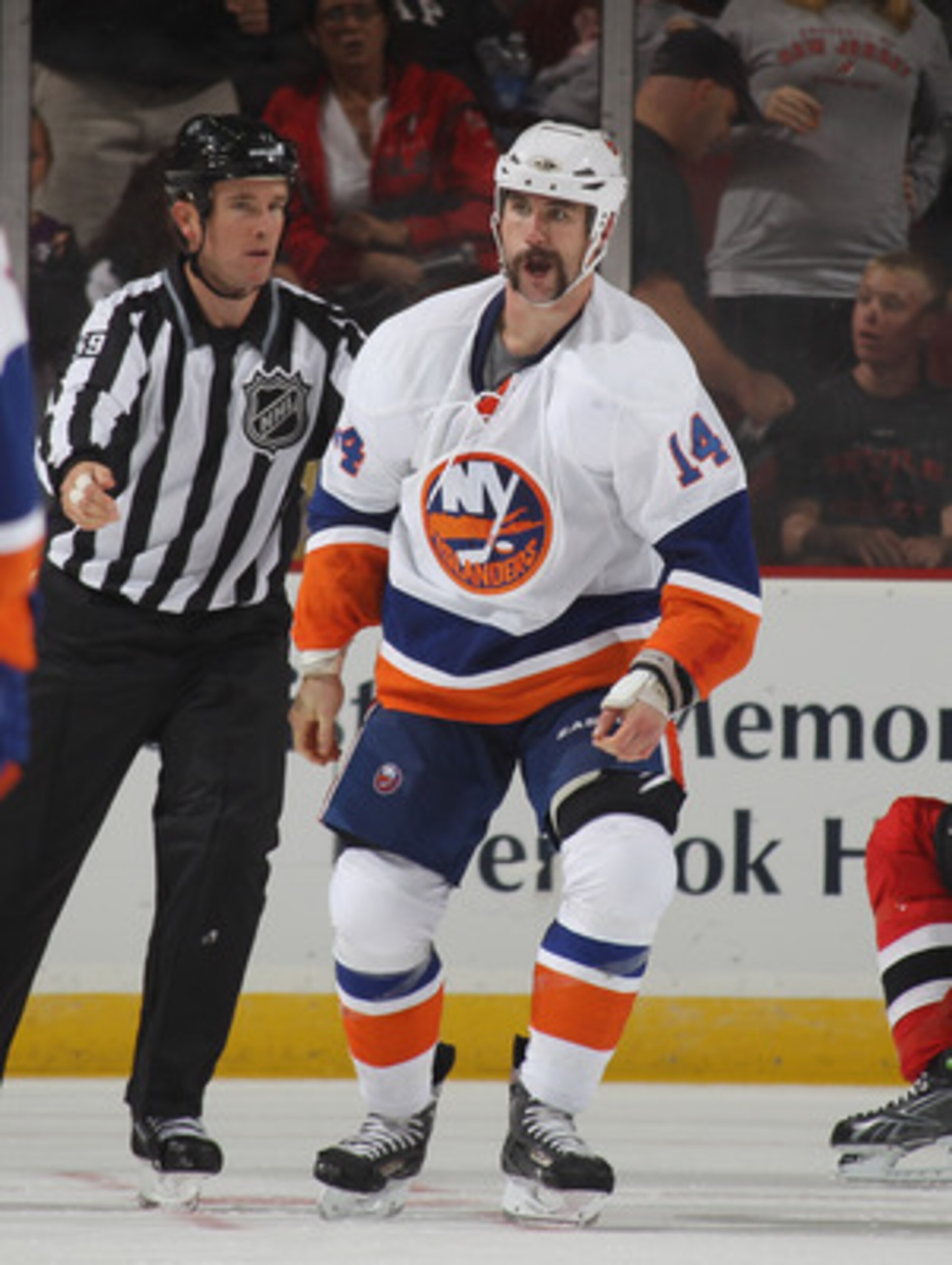 NEWARK, NJ - OCTOBER 01:  Trevor Gillies #14 of the New York Islanders skates  against the New Jersey Devils at the Prudential Center on October 1, 2010 in Newark, New Jersey.The Devils defeated the Islanders 4-3.  (Photo by Bruce Bennett/Getty Images)