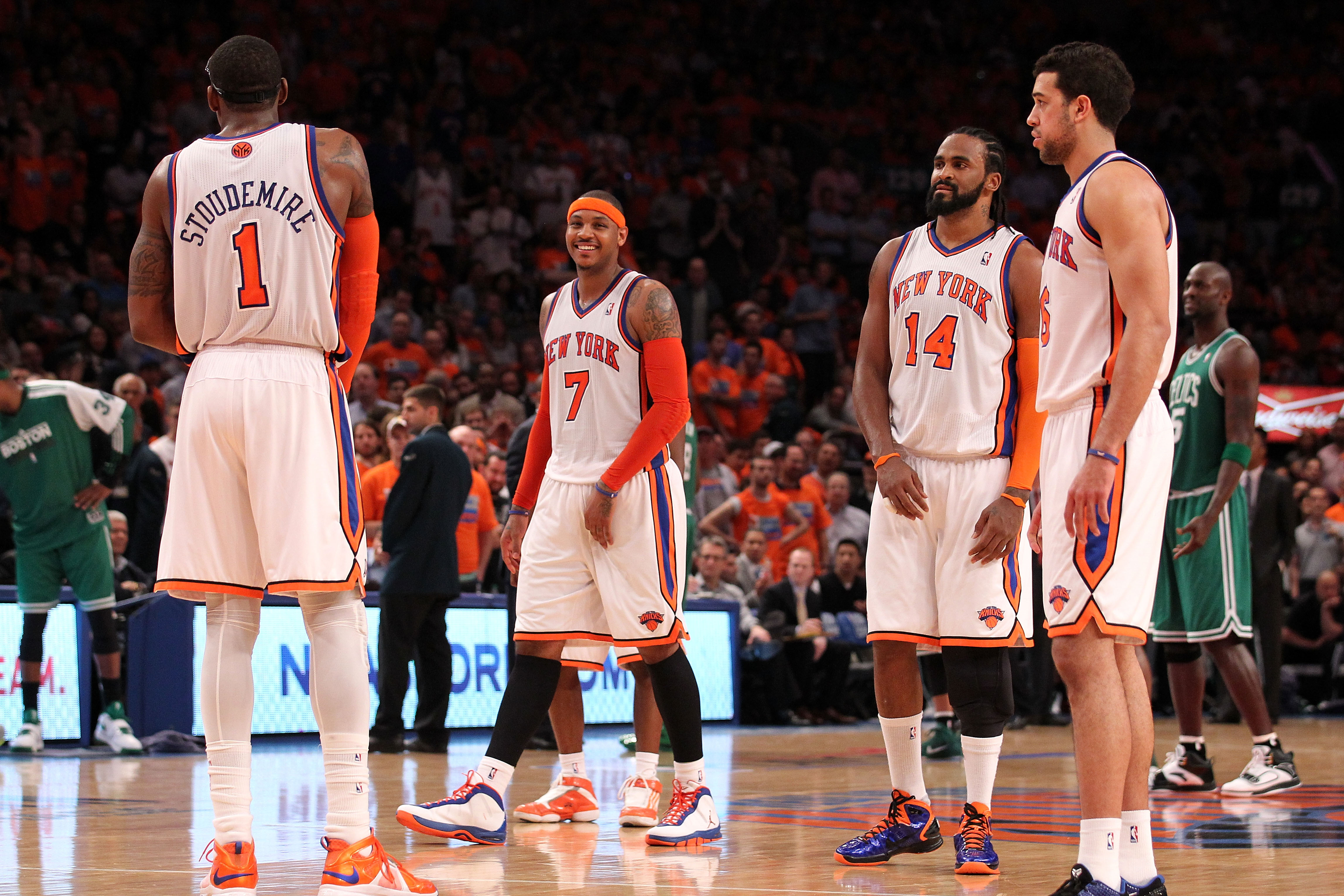 NEW YORK, NY - APRIL 24:  (L-R) Amar'e Stoudemire #1, Carmelo Anthony #7, Ronny Turiaf #14 and Landry Fields #6 of the New York Knicks look on against the Boston Celtics in Game Four of the Eastern Conference Quarterfinals during the 2011 NBA Playoffs on