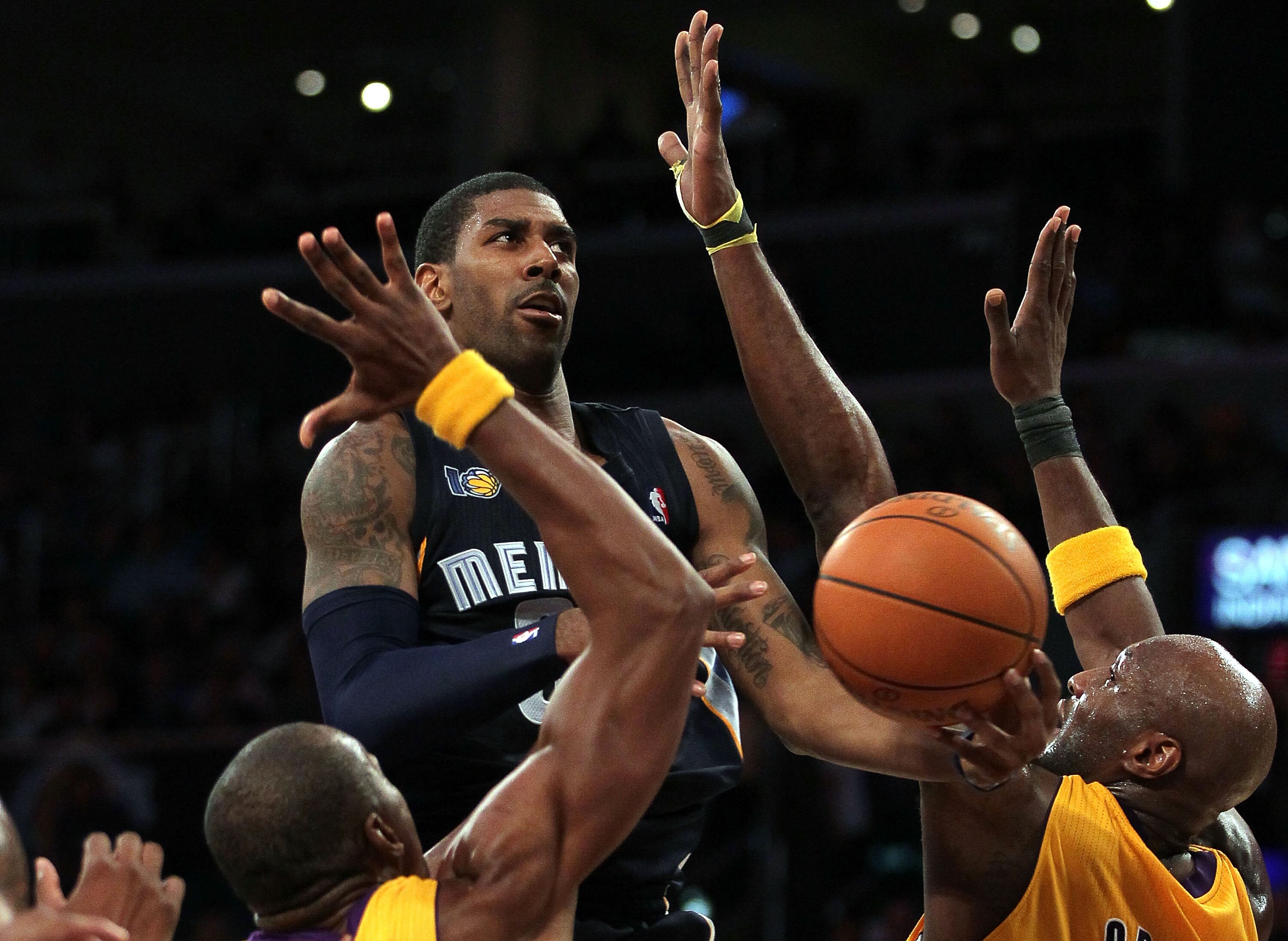 LOS ANGELES, CA - NOVEMBER 02:  O.J. Mayo #32 of the Memphis Grizzlies attempts a lay up against the Los Angeles Lakers during the game at Staples Center on November 2, 2010 in Los Angeles, California. The Lakers defeated the Grizzlies 124-105. NOTE TO US