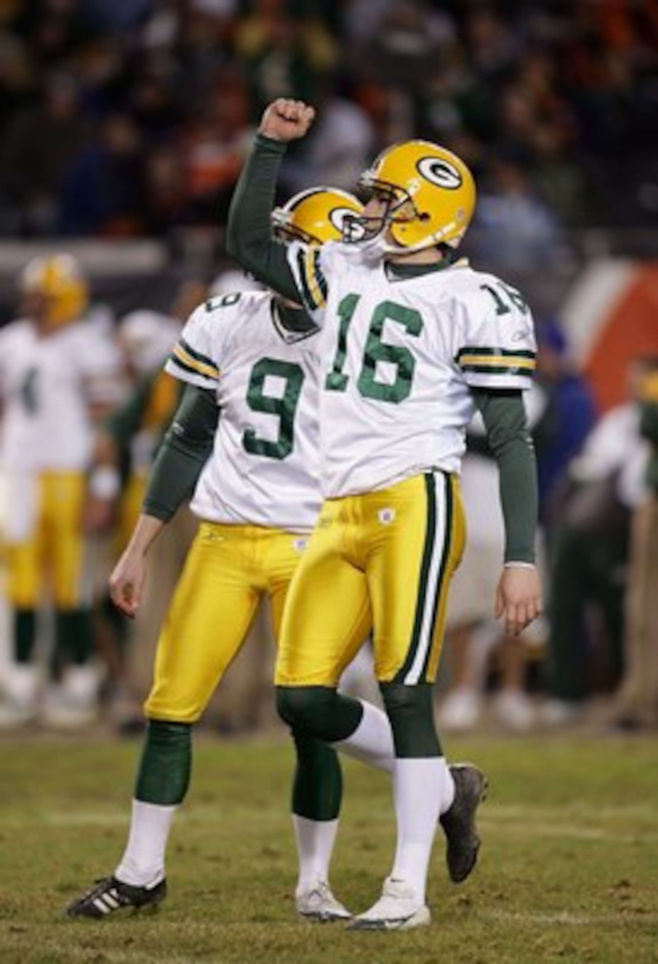 CHICAGO - DECEMBER 31:  Kicker Dave Rayner #16 of the Green Bay Packers celebrates a successful kick attempt against the Chicago Bears December 31, 2006 at Soldier Field in Chicago, Illinois. The Packers won 26-7. (Photo by Jonathan Daniel/Getty Images)