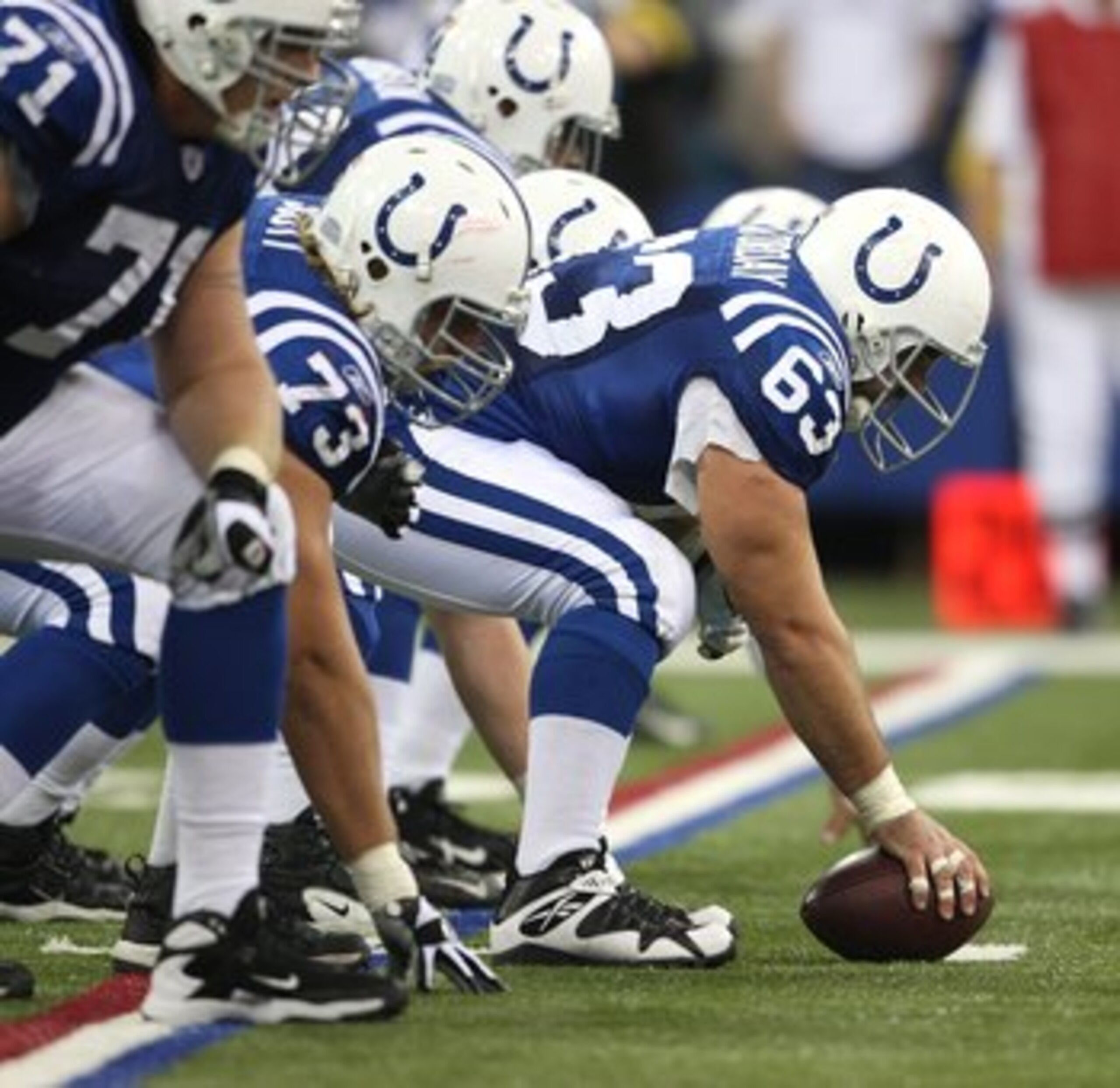 INDIANAPOLIS - NOVEMBER 04:  Offensive center Jeff Saturday #63 of the Indianapolis Colts readies the ball for the snap against the New England Patriots on November 4, 2007 at the RCA Dome in Indianapolis, Indiana. The Patriots won 24-20. (Photo by Andy L