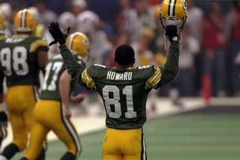 26 Jan 1997:  Wide receiver Desmond Howard of the Green Bay Packers celebrates during Super Bowl XXXI against the New England Patriots at the Superdome in New Orleans, Louisiana.  The Packers won the game, 35-21. Mandatory Credit: Brian Bahr  /Allsport