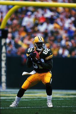12 Sep 1999:  Desmond Howard #82 of the Green Bay Packers is in action during the game against the Oakland Raiders at Lambeau Field in Green Bay, Wisconsin. The Packers defeated the Raiders 28-24. Mandatory Credit: Brian Bahr  /Allsport