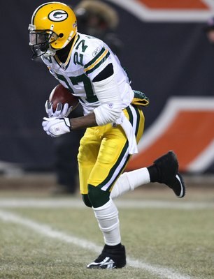 CHICAGO - DECEMBER 22: Will Blackmon #27 of the Green Bay Packers returns a kick-off against the Chicago Bears on December 22, 2008 at Soldier Field in Chicago, Illinois. The Bears defeated the Packers 20-17 in overtime. (Photo by Jonathan Daniel/Getty Im