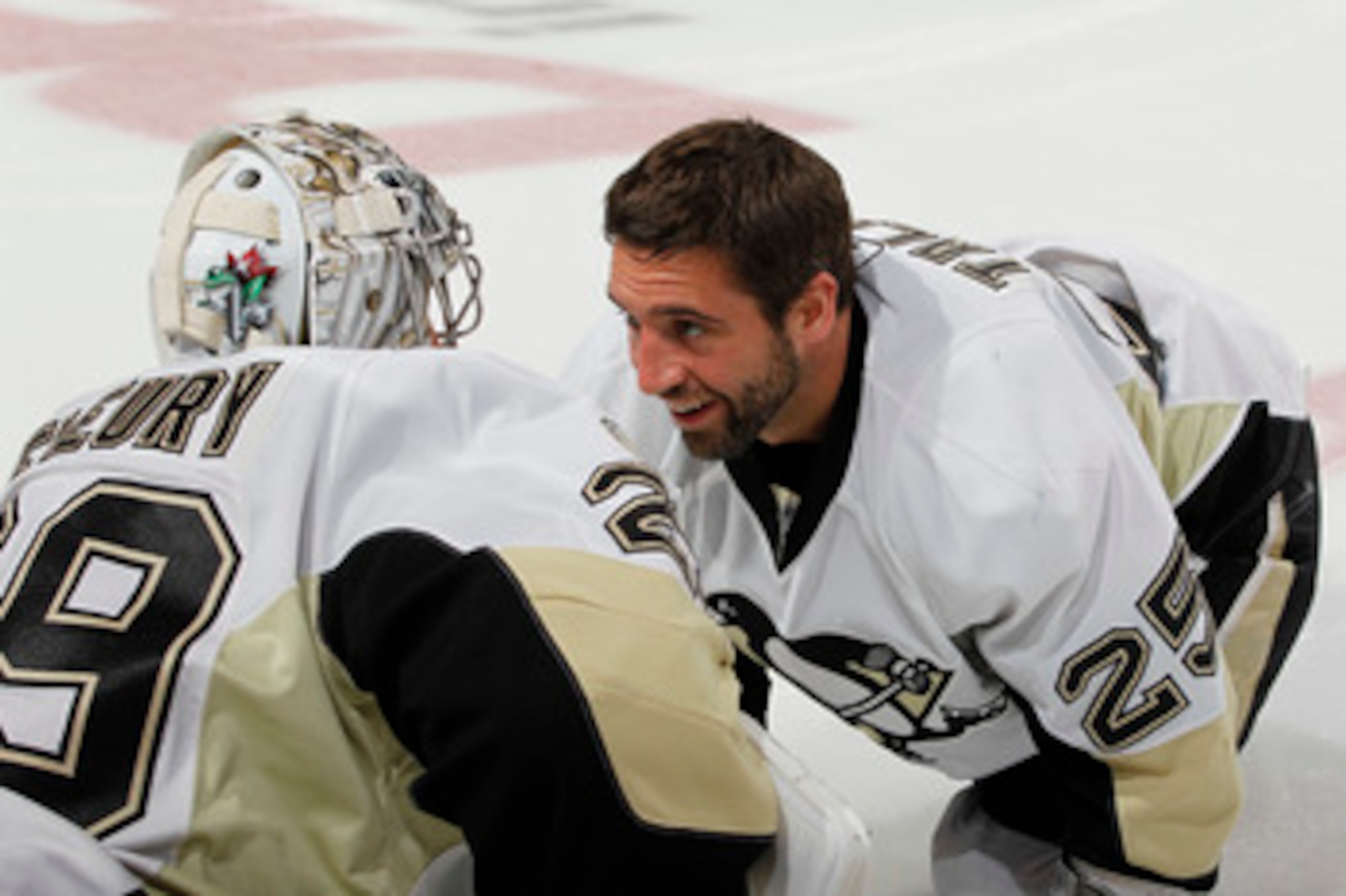 SUNRISE, FL - APRIL 2: Maxime Talbot #25 talks to goaltender Marc-Andre Fleury #29 of the Pittsburgh Penguins prior to the NHL game against the Florida Panthers on April 2, 2011 at the BankAtlantic Center in Sunrise, Florida. (Photo by Joel Auerbach/Getty